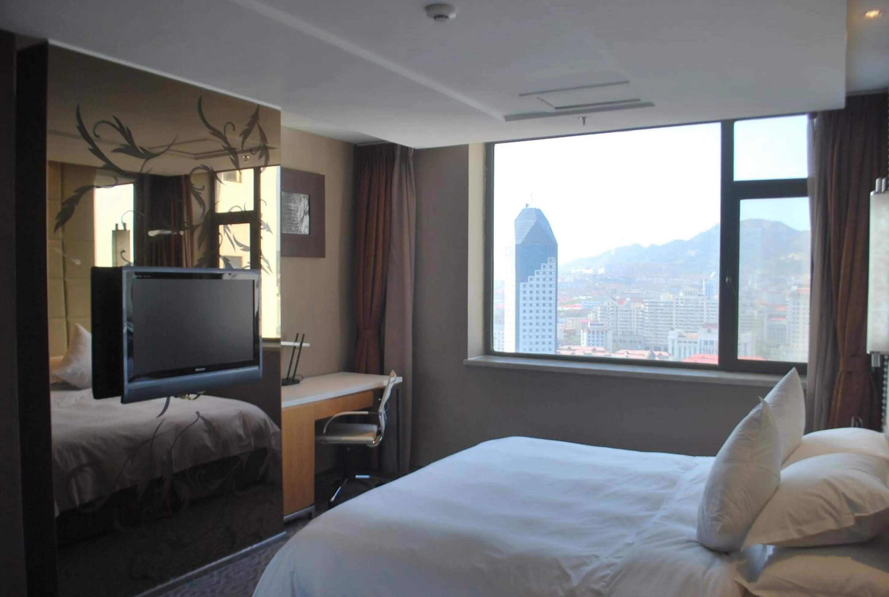 Bed in The Center Hotel Weihai