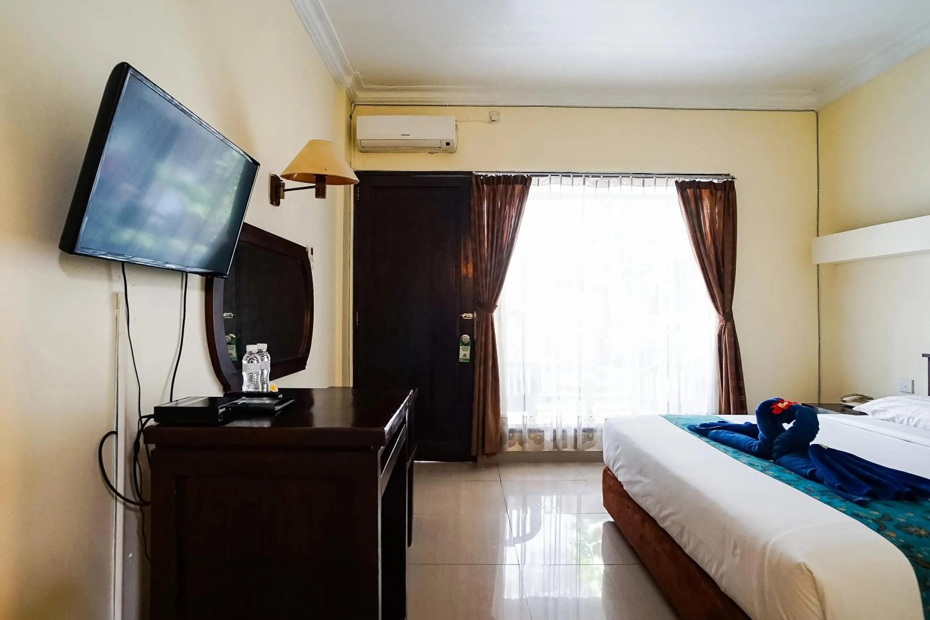 Photo of the whole room, Bed in Taman Ayu Legian Hotel