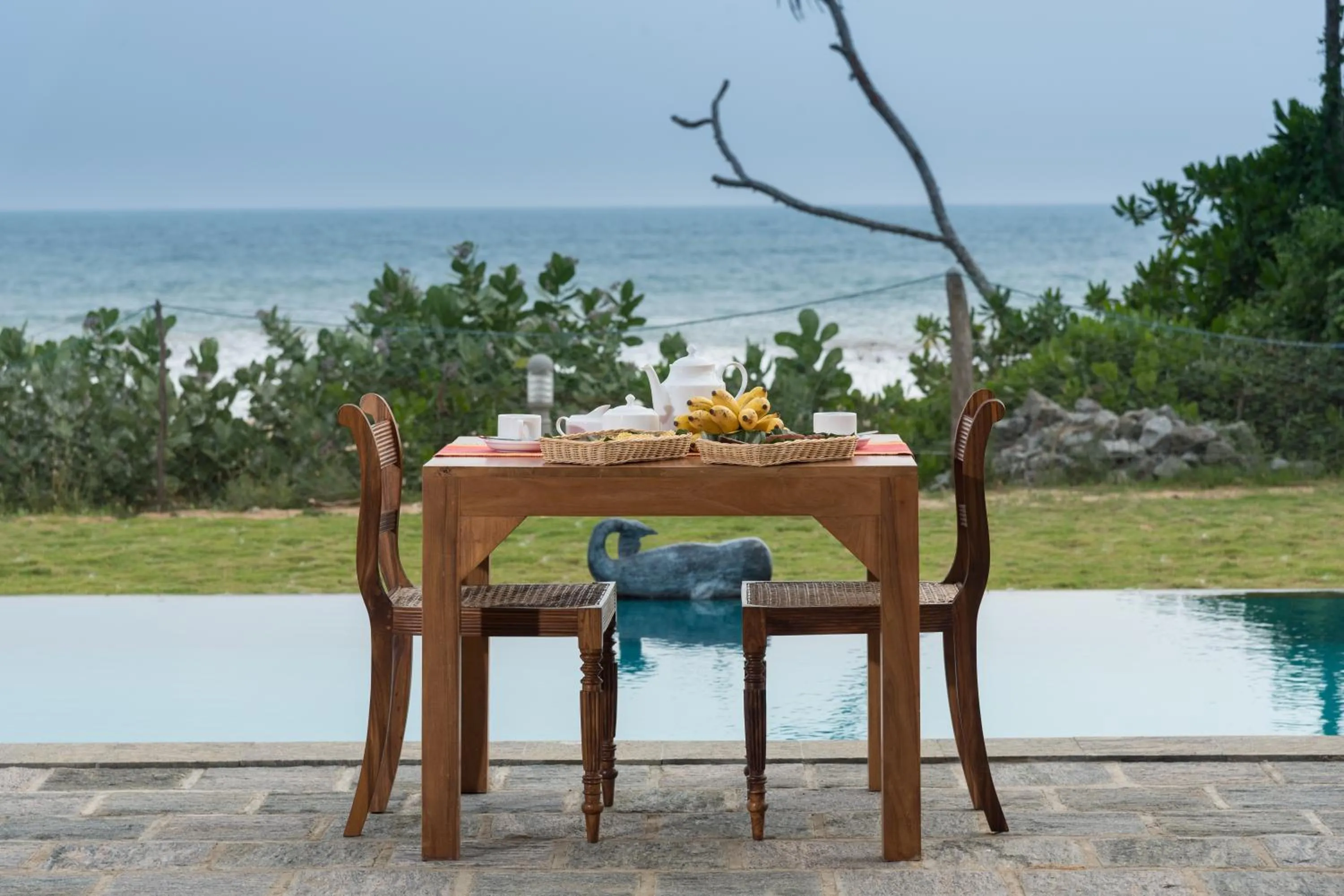 Swimming pool, Beach in Bungalow By The Beach