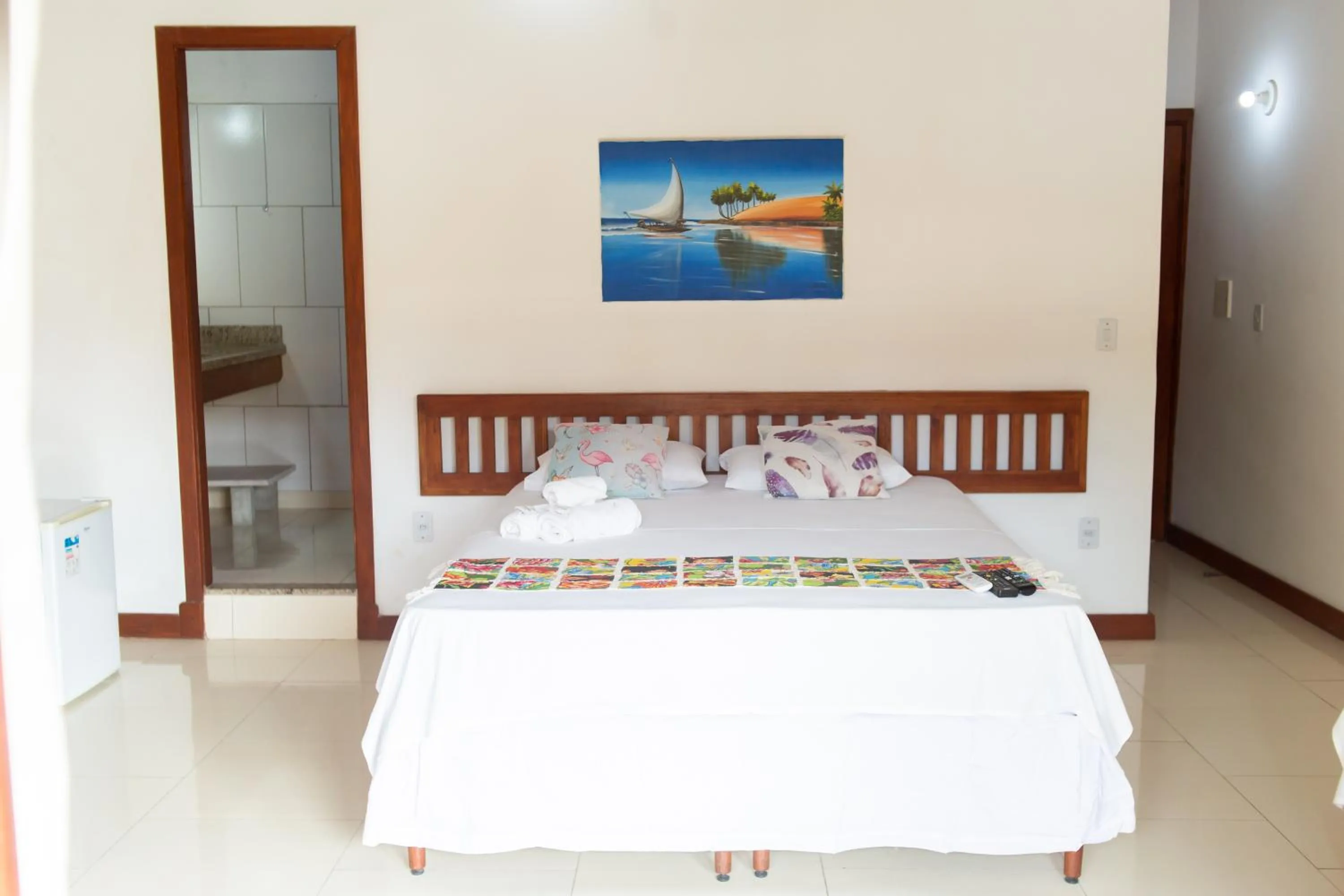 Bed in Pousada Flor do Arraial