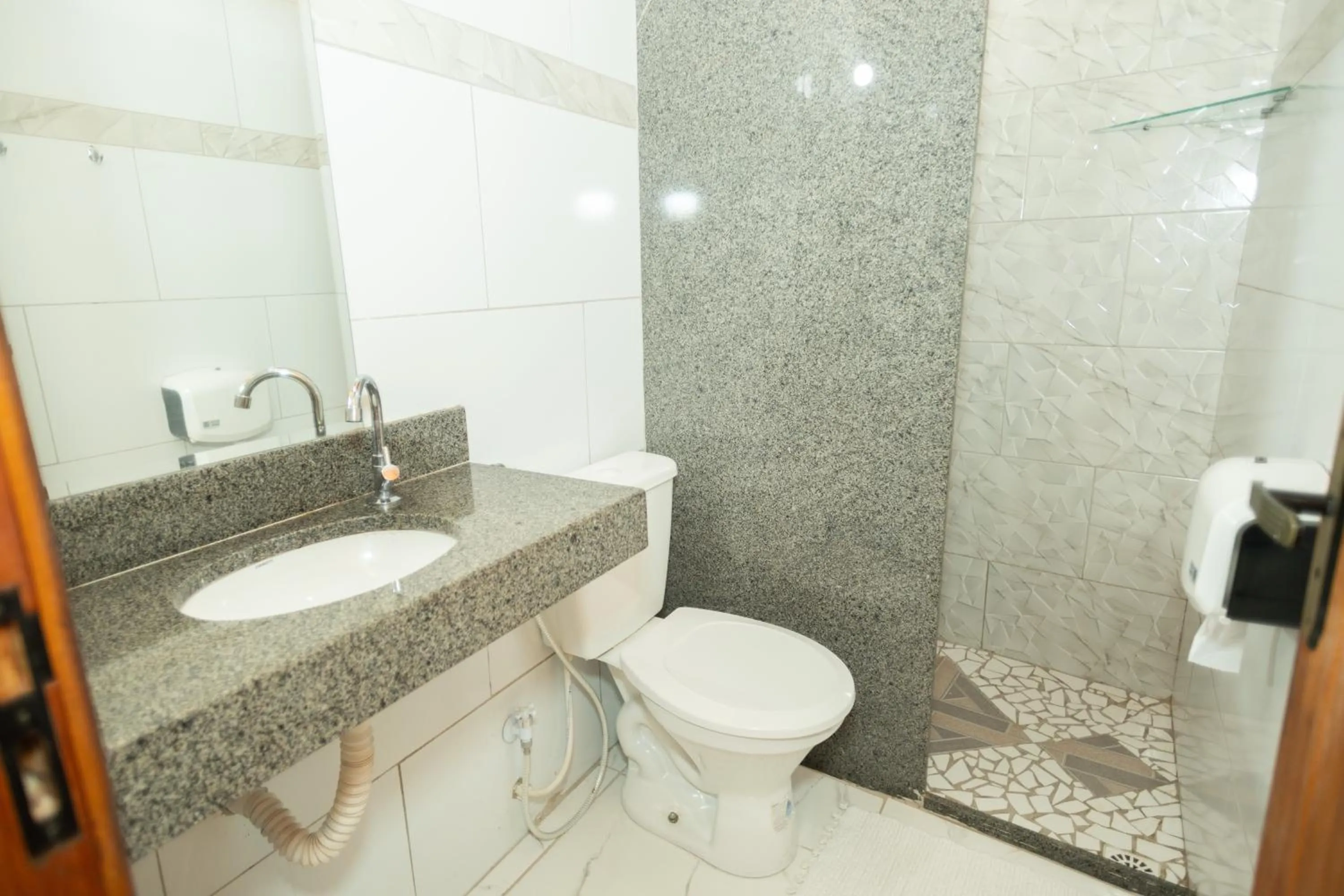 Toilet in Pousada Flor do Arraial