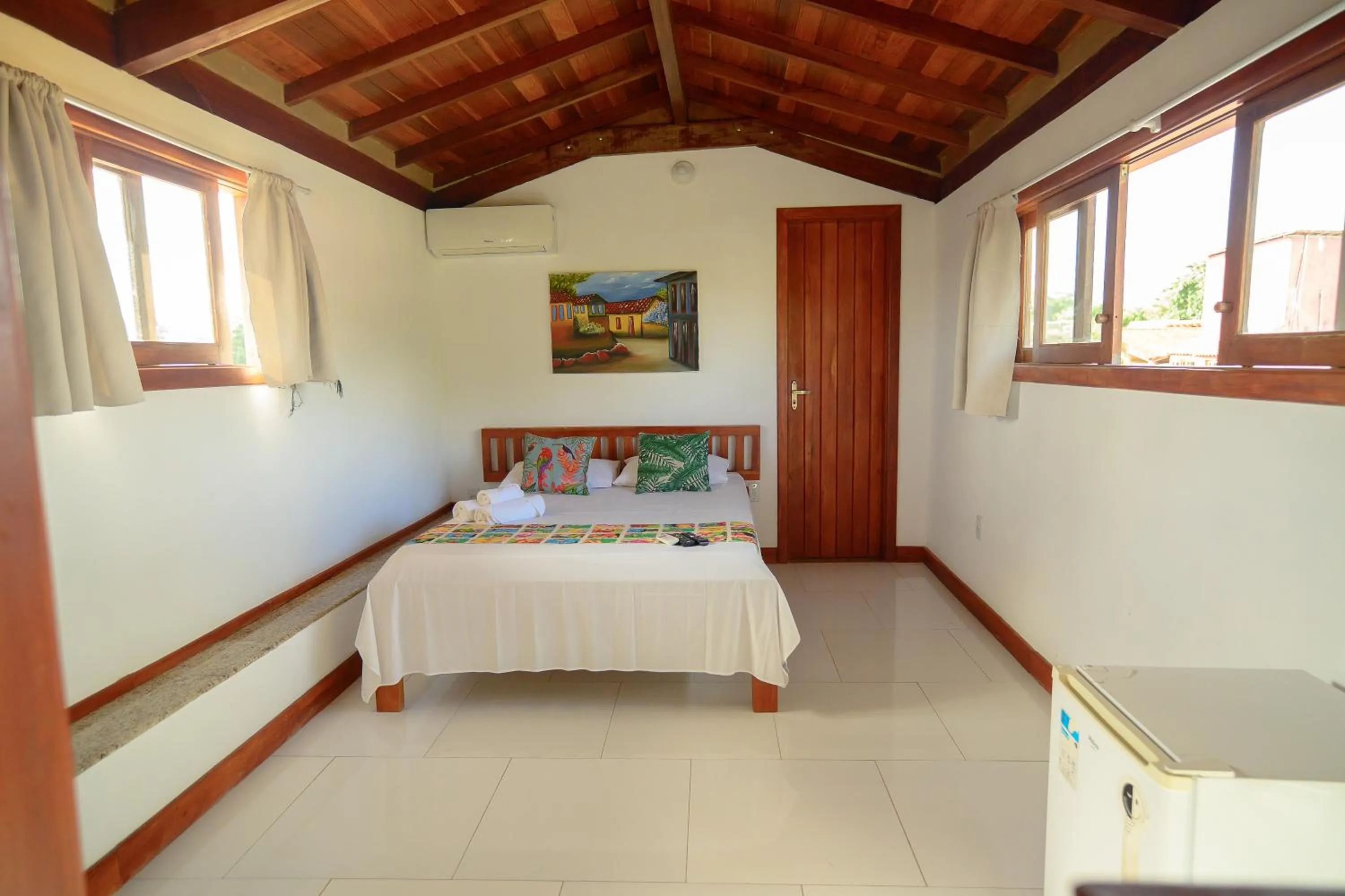 Bed in Pousada Flor do Arraial