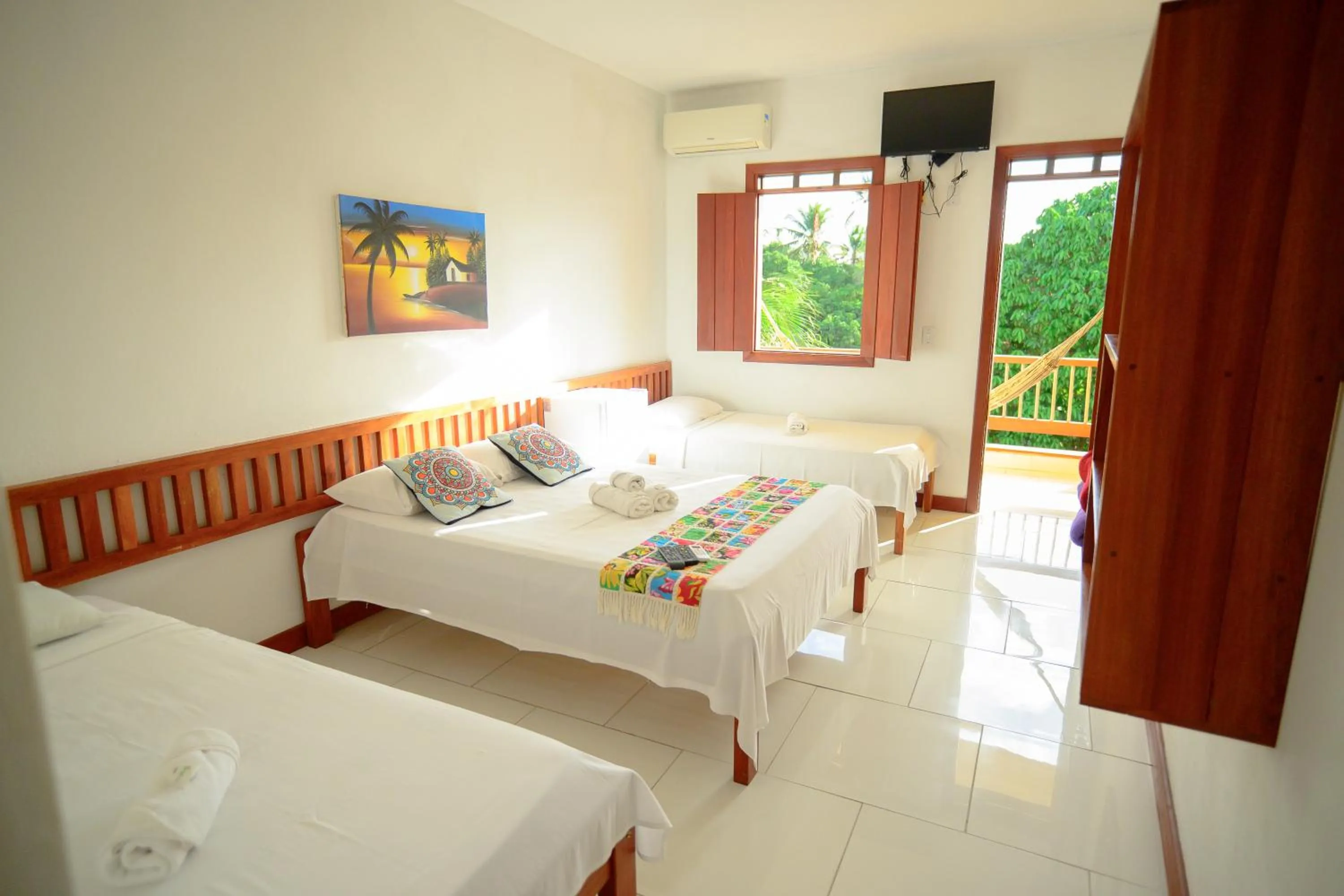 Bed in Pousada Flor do Arraial