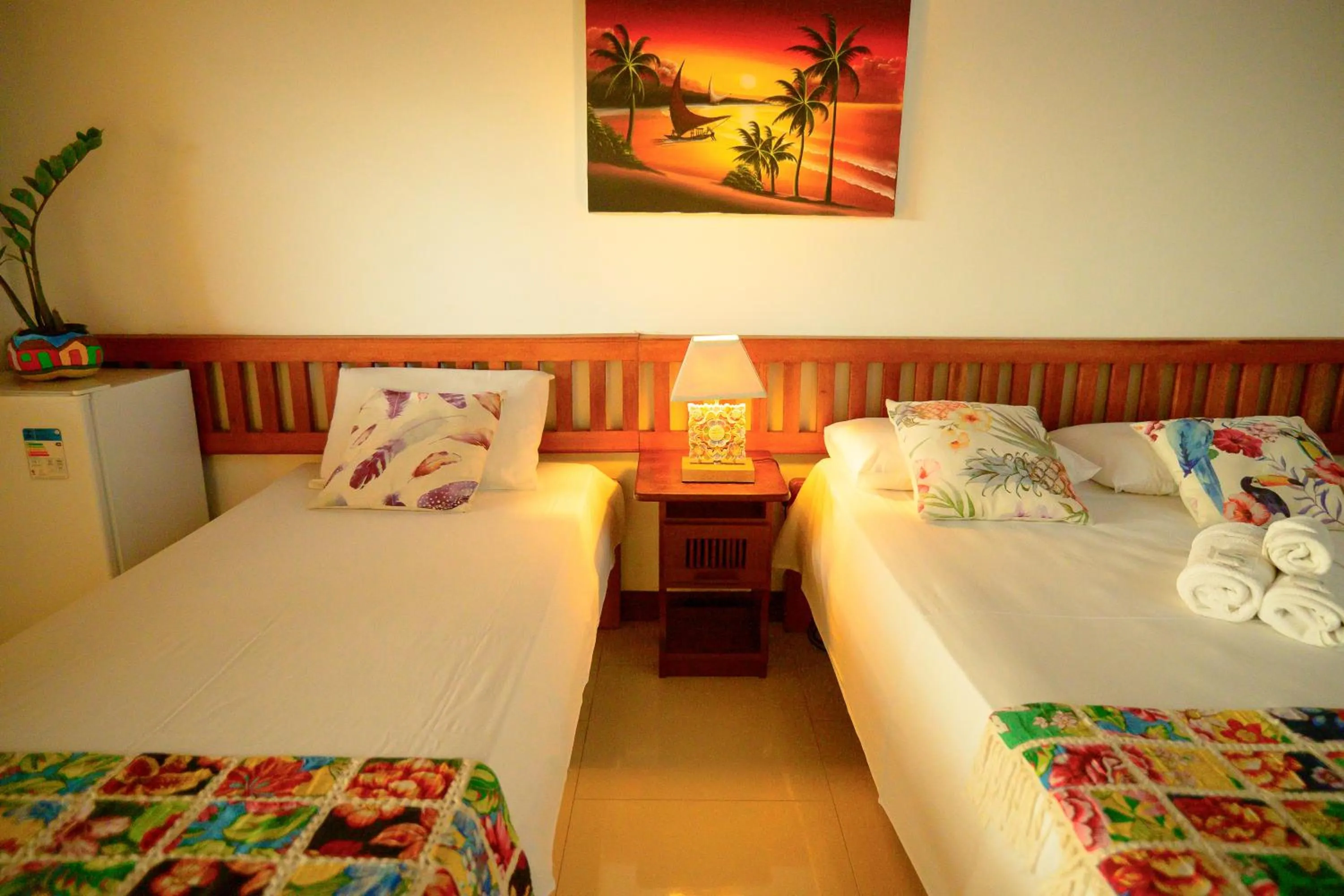 Bed in Pousada Flor do Arraial