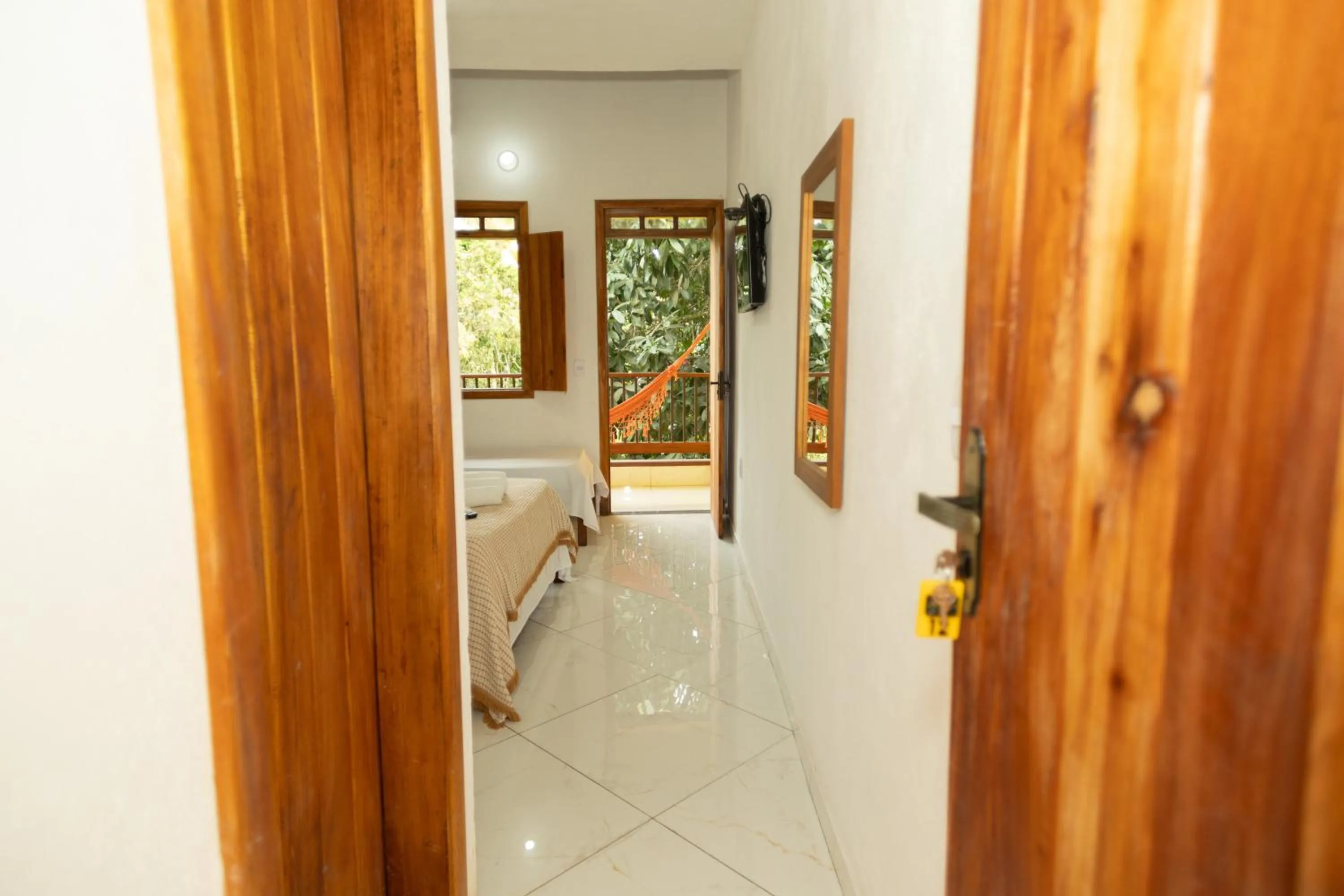 Bedroom in Pousada Flor do Arraial