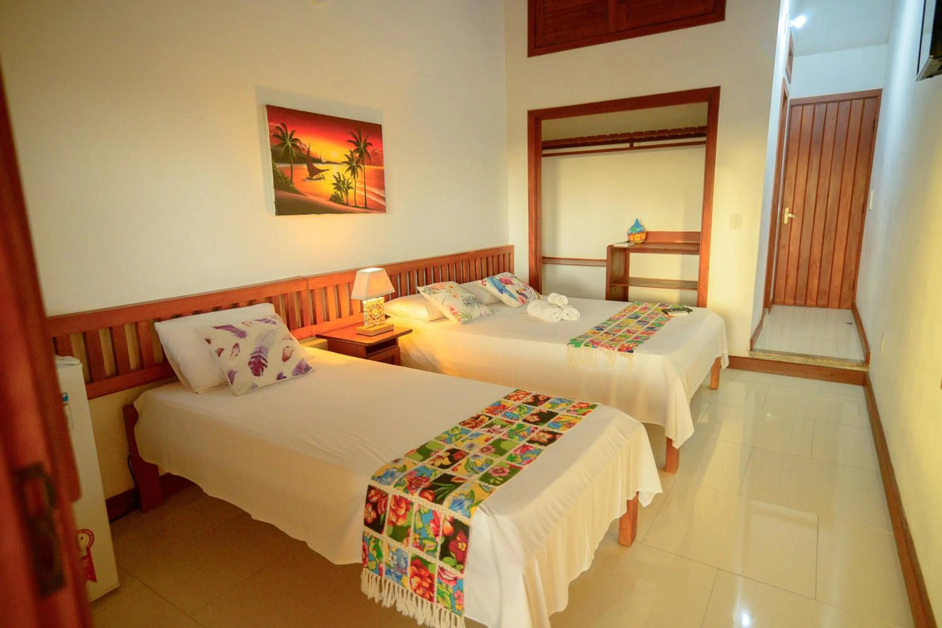 Bed in Pousada Flor do Arraial