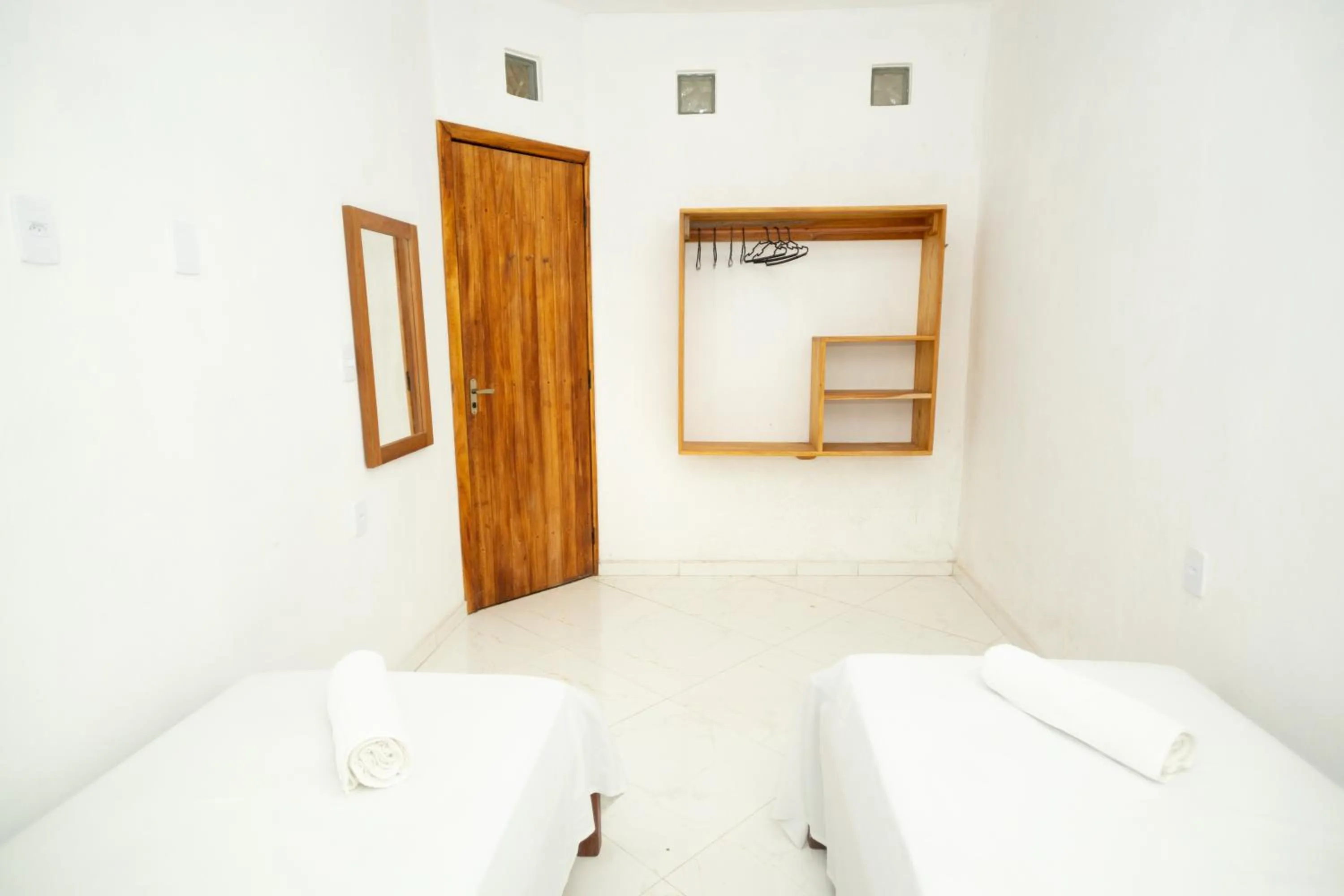 Bed in Pousada Flor do Arraial