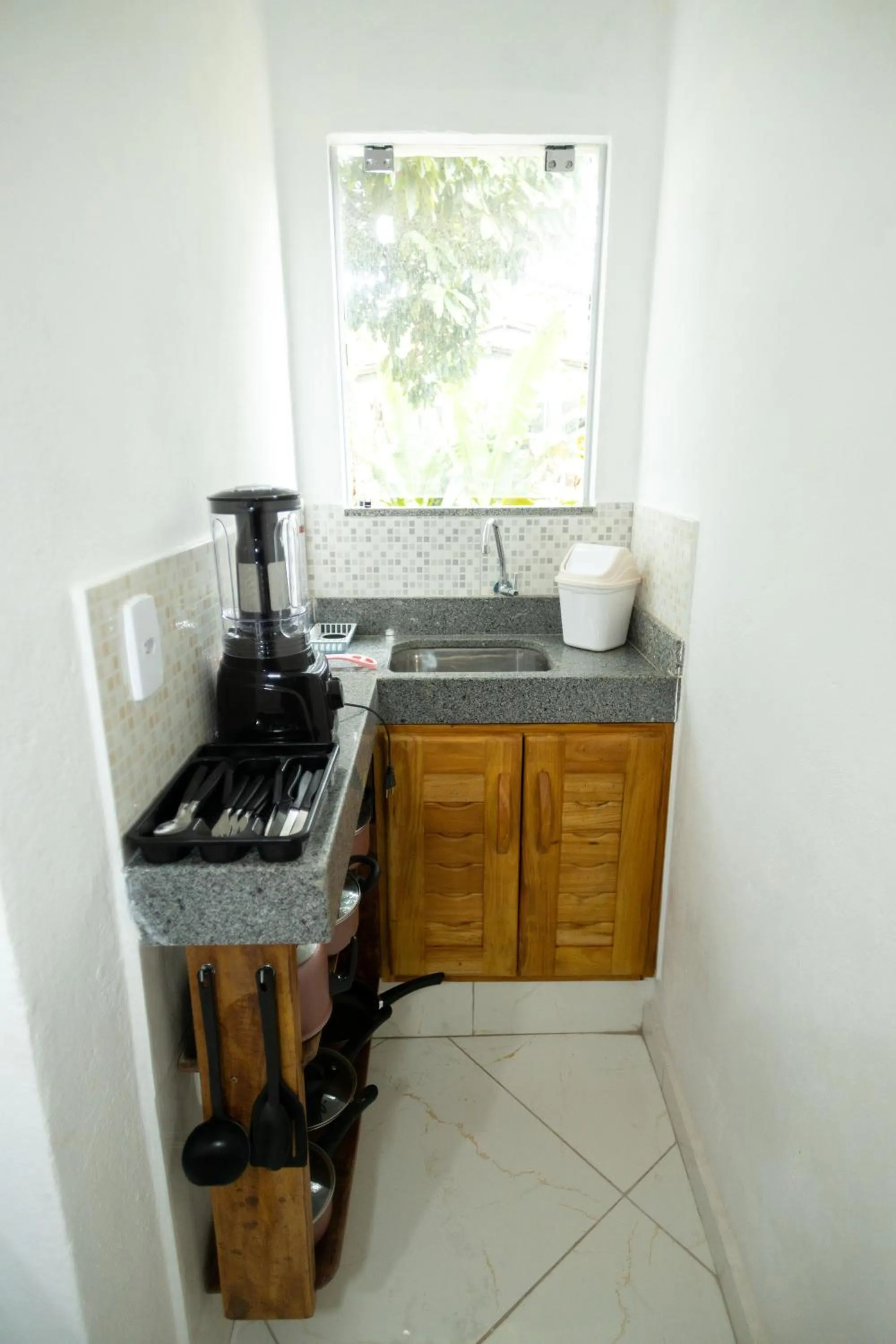 Kitchen or kitchenette in Pousada Flor do Arraial