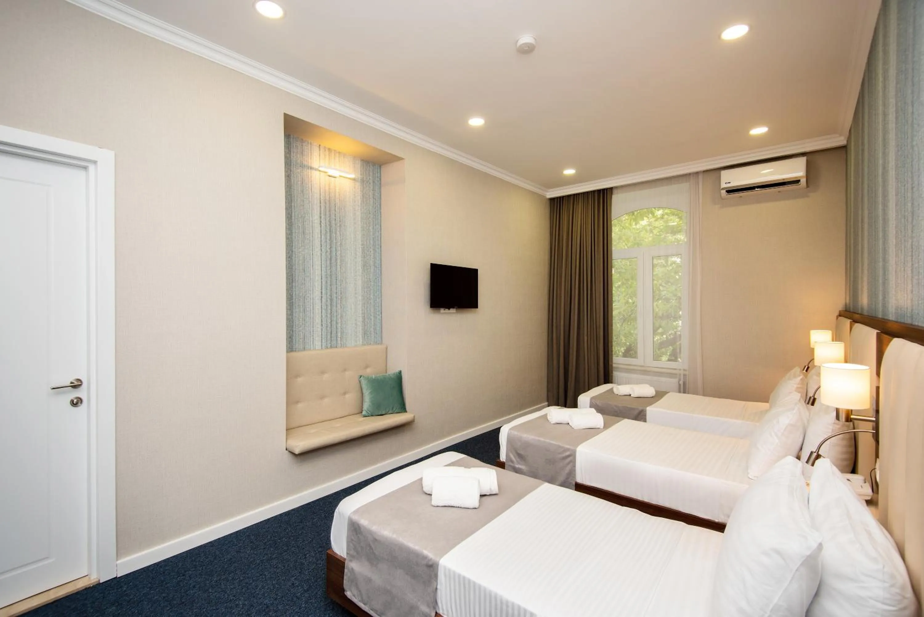 Photo of the whole room, Bed in Margi Boutique Hotel by DNT Group