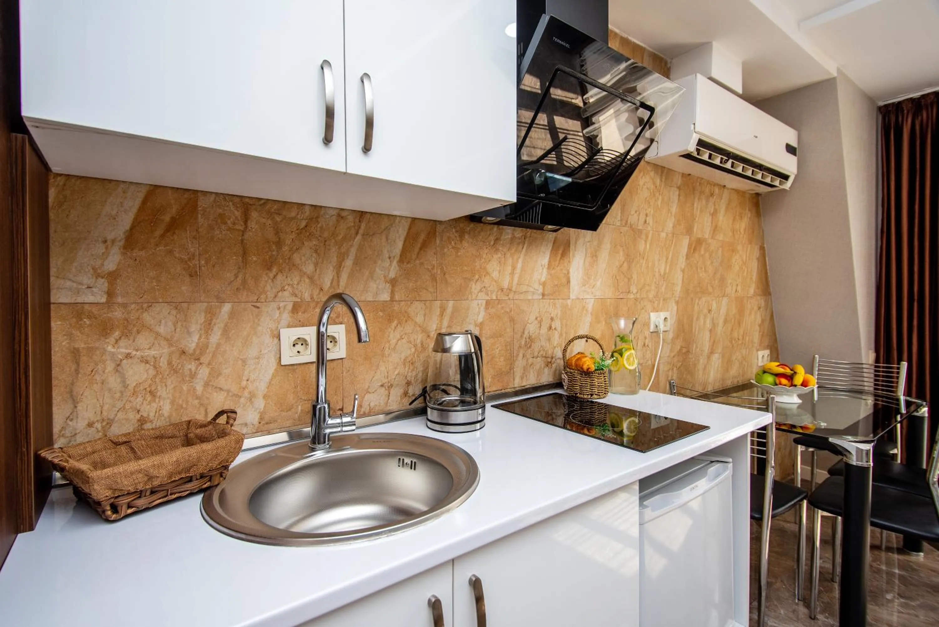 Kitchen or kitchenette in Margi Boutique Hotel by DNT Group