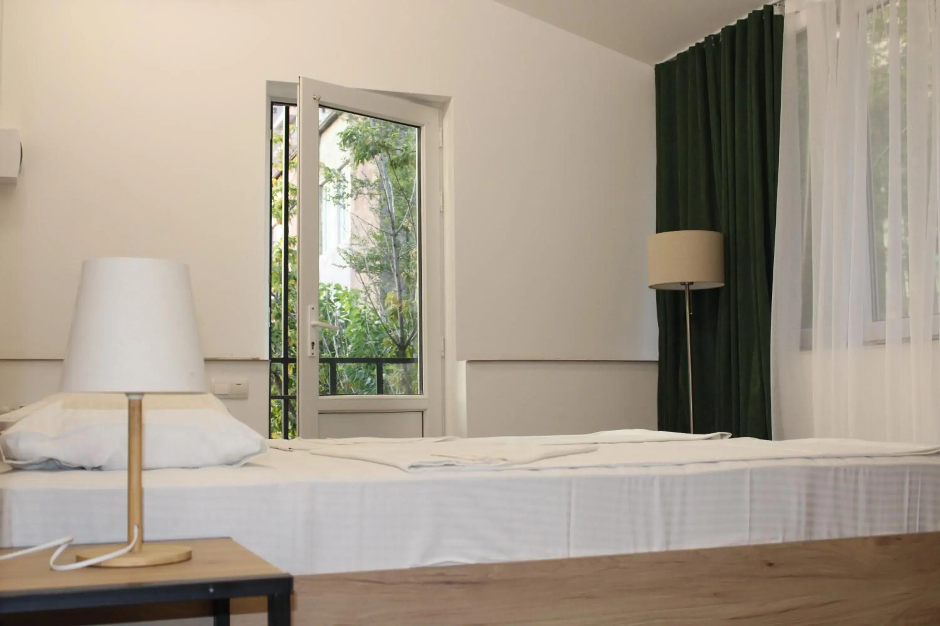 Deluxe Double Room with Balcony - single occupancy in JR's House Deluxe Double Room with Balcony - single occupancy in JR's House