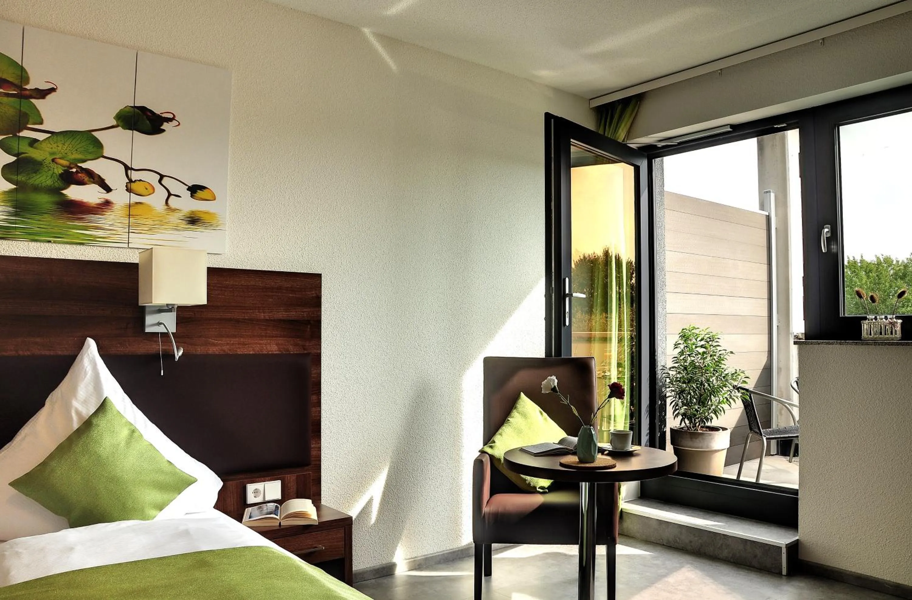 Seating area, Bed in Motel am Fürfelder Schloss