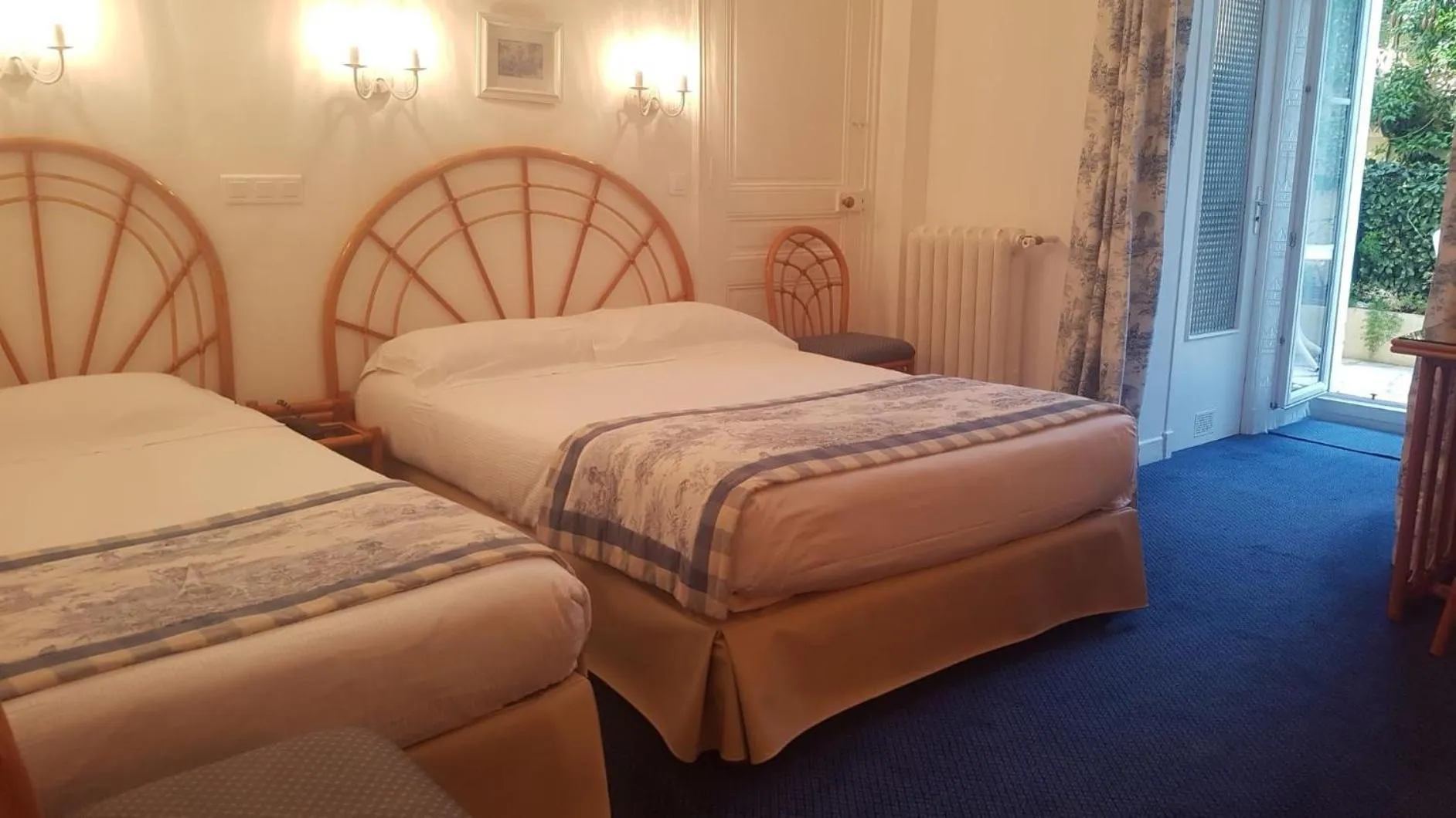 Bed in Hôtel de Charme Brise Marine