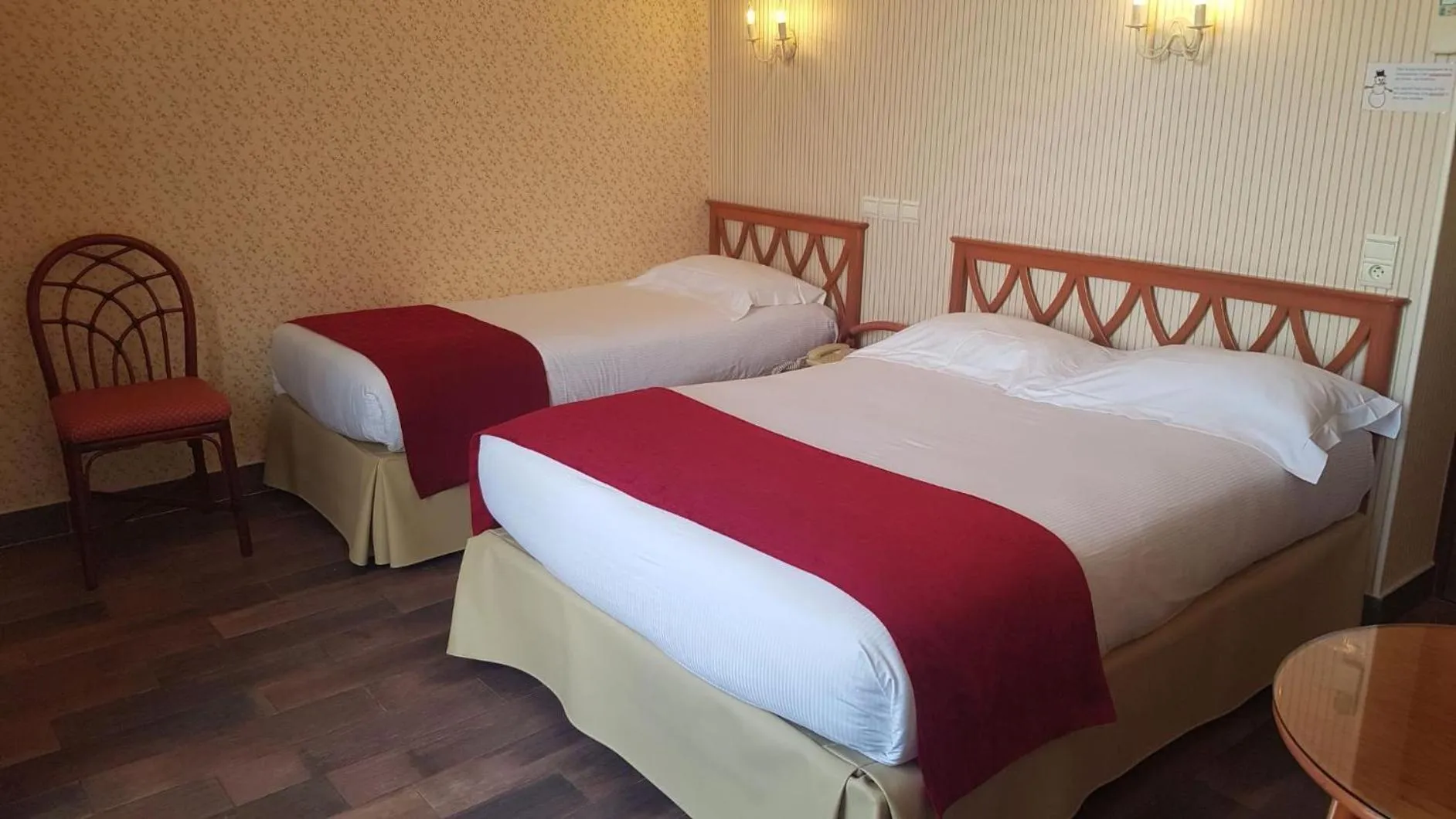 Bed in Hôtel de Charme Brise Marine