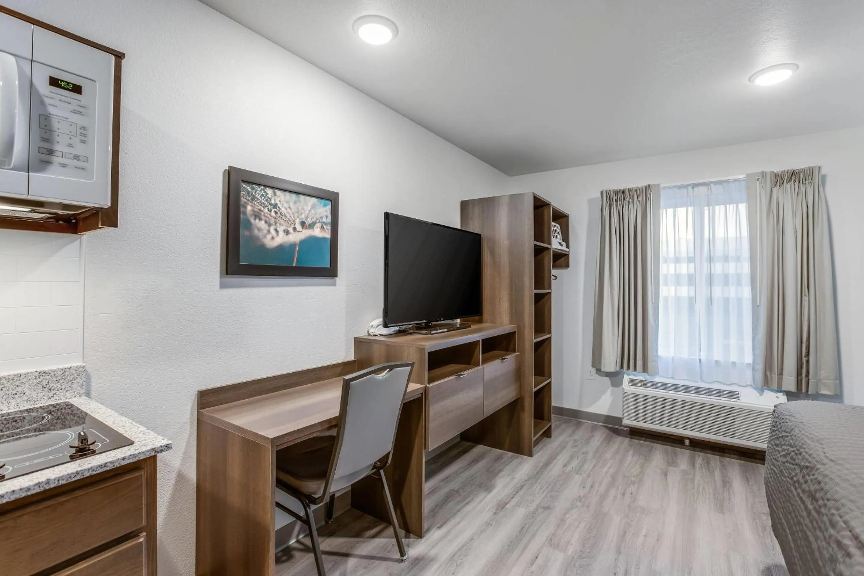 Bedroom, Bed in WoodSpring Suites Novi Farmington