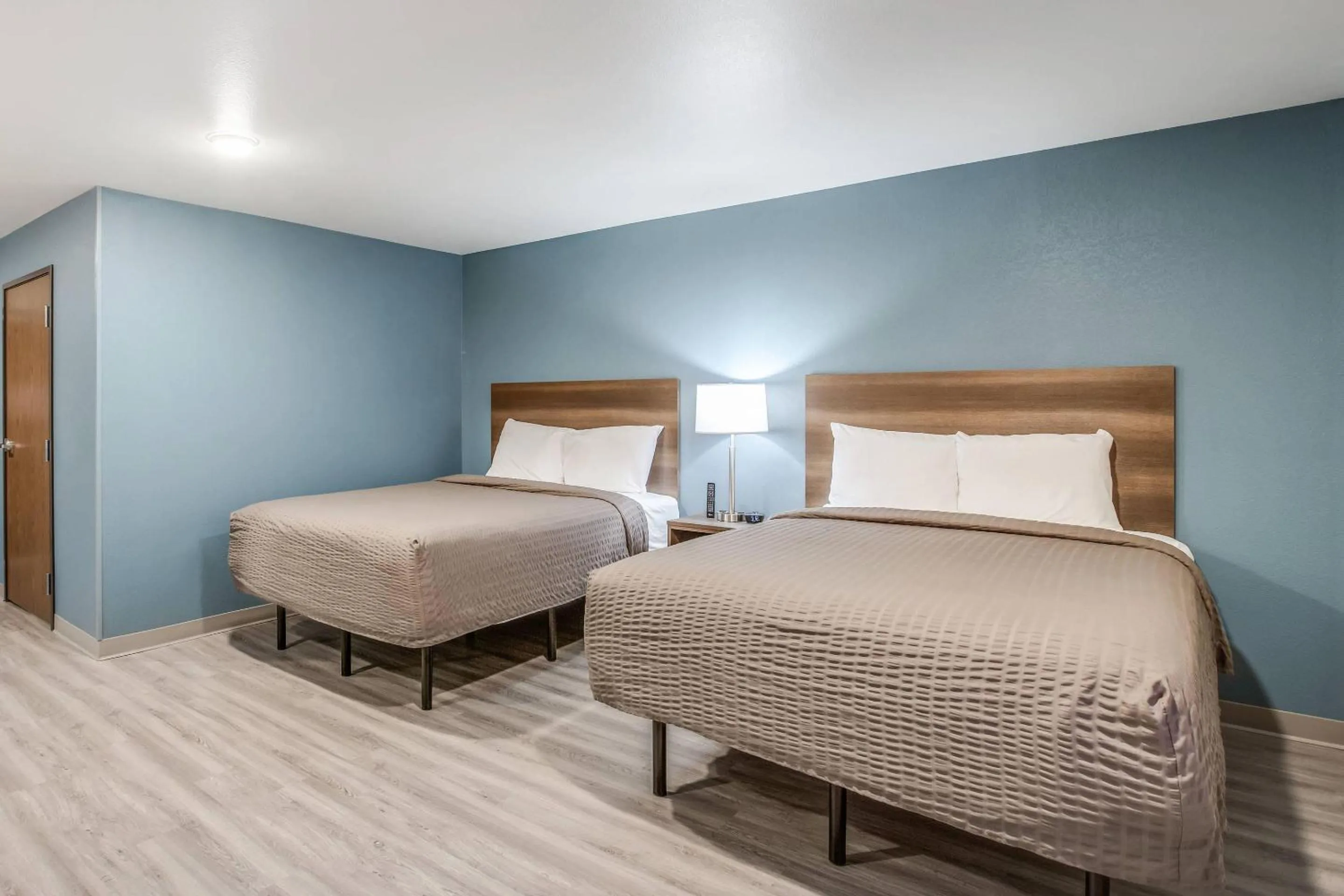 Bedroom, Bed in WoodSpring Suites Novi Farmington