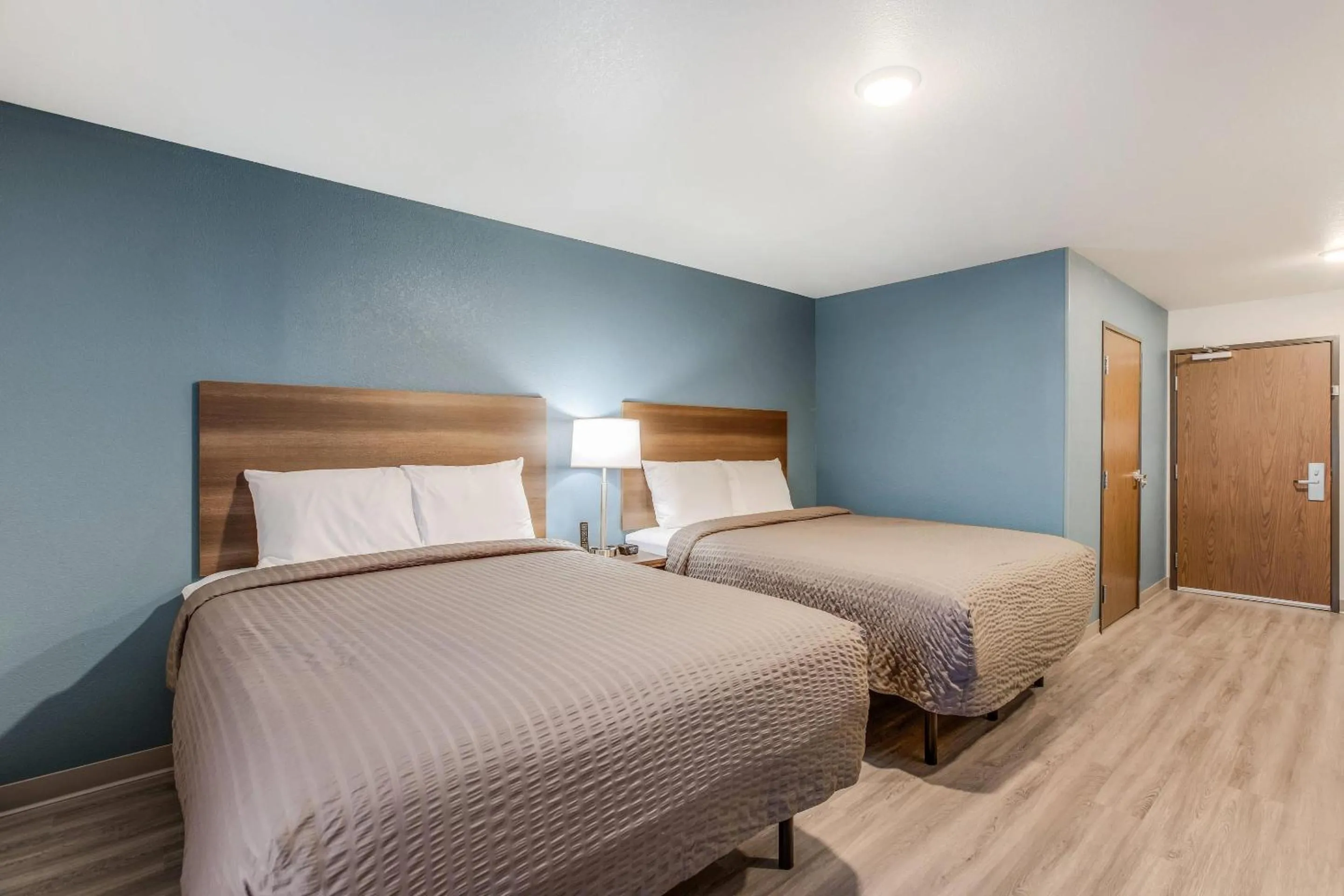 Bedroom, Bed in WoodSpring Suites Novi Farmington
