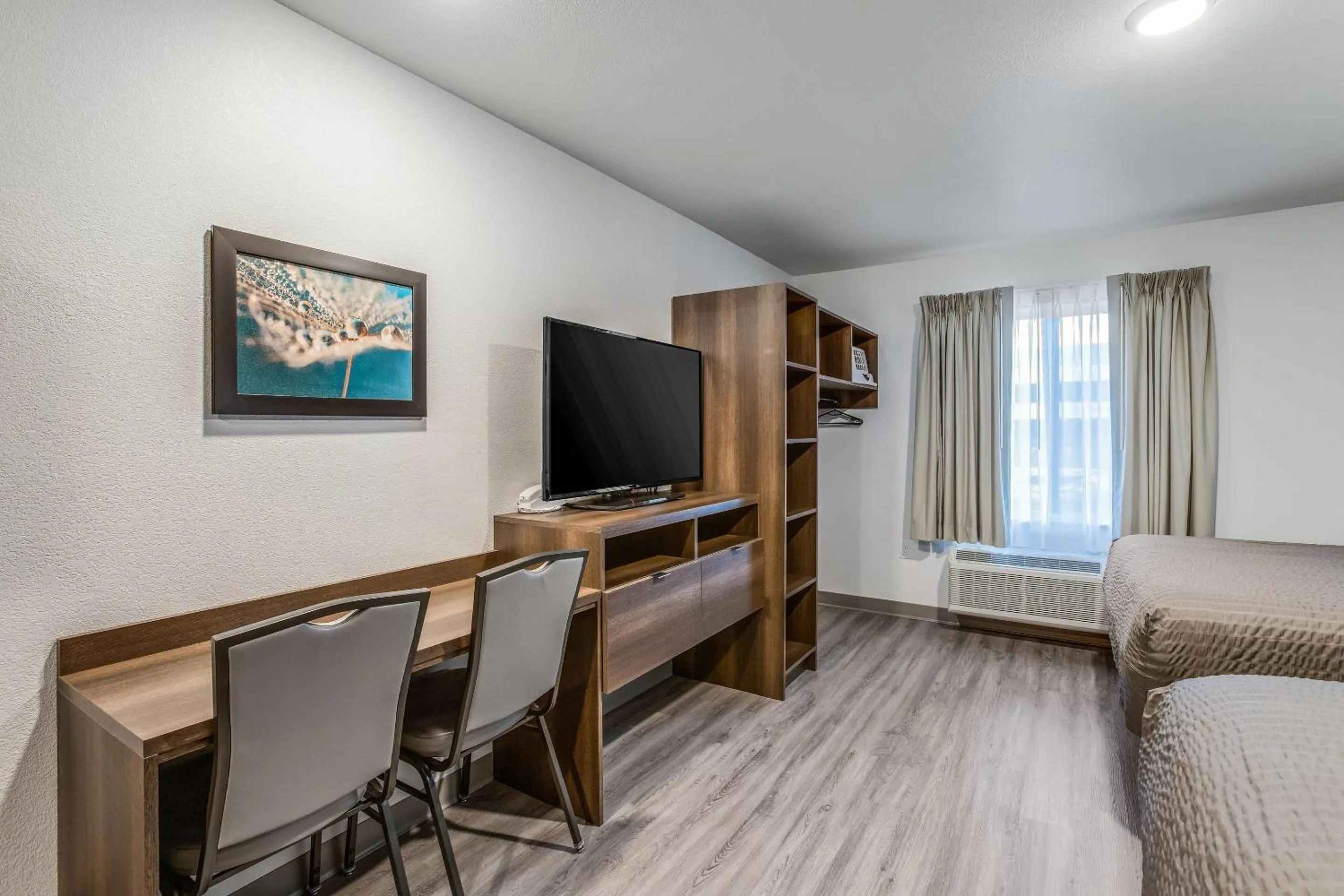 Bedroom in WoodSpring Suites Novi Farmington