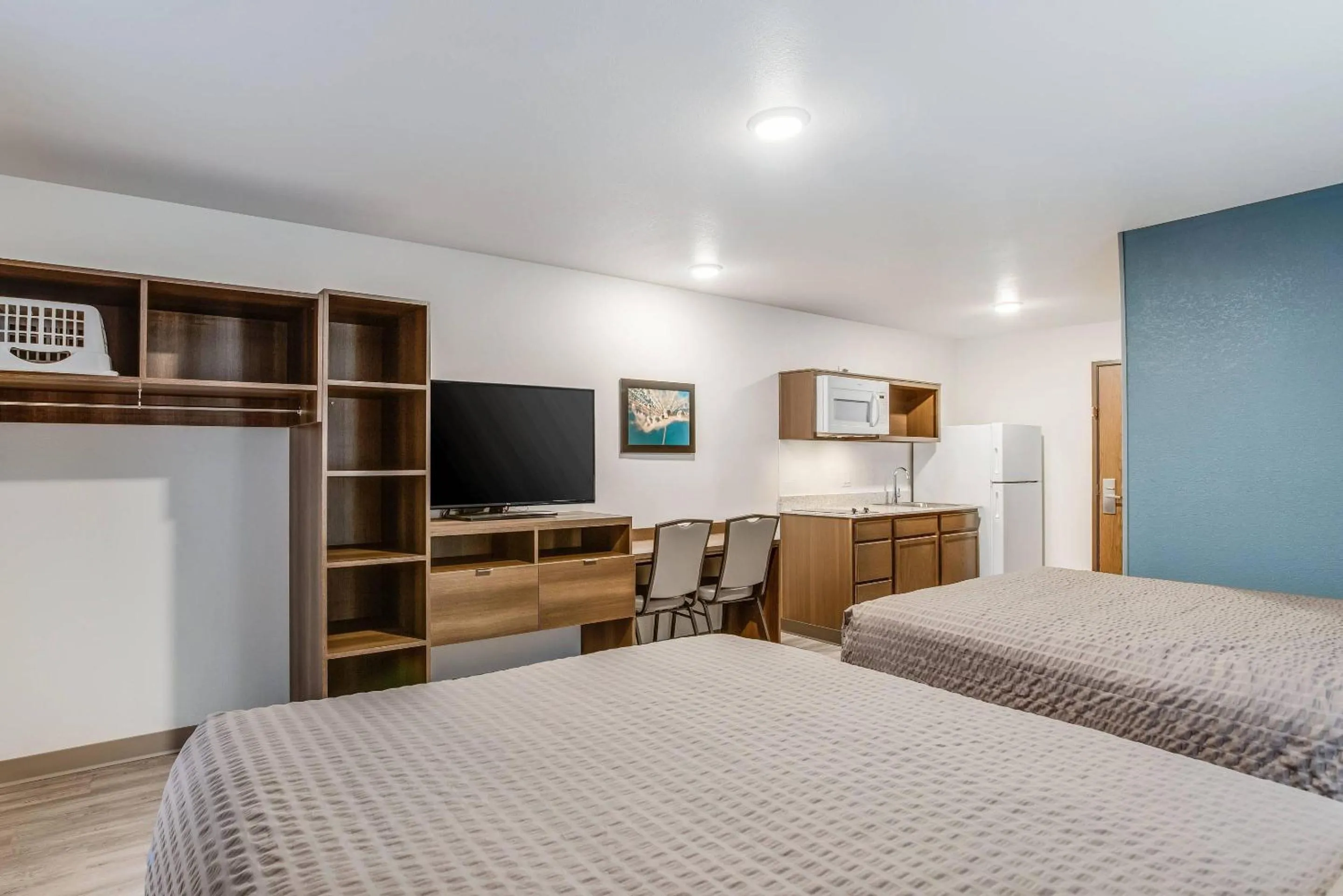Bedroom, Bed in WoodSpring Suites Novi Farmington