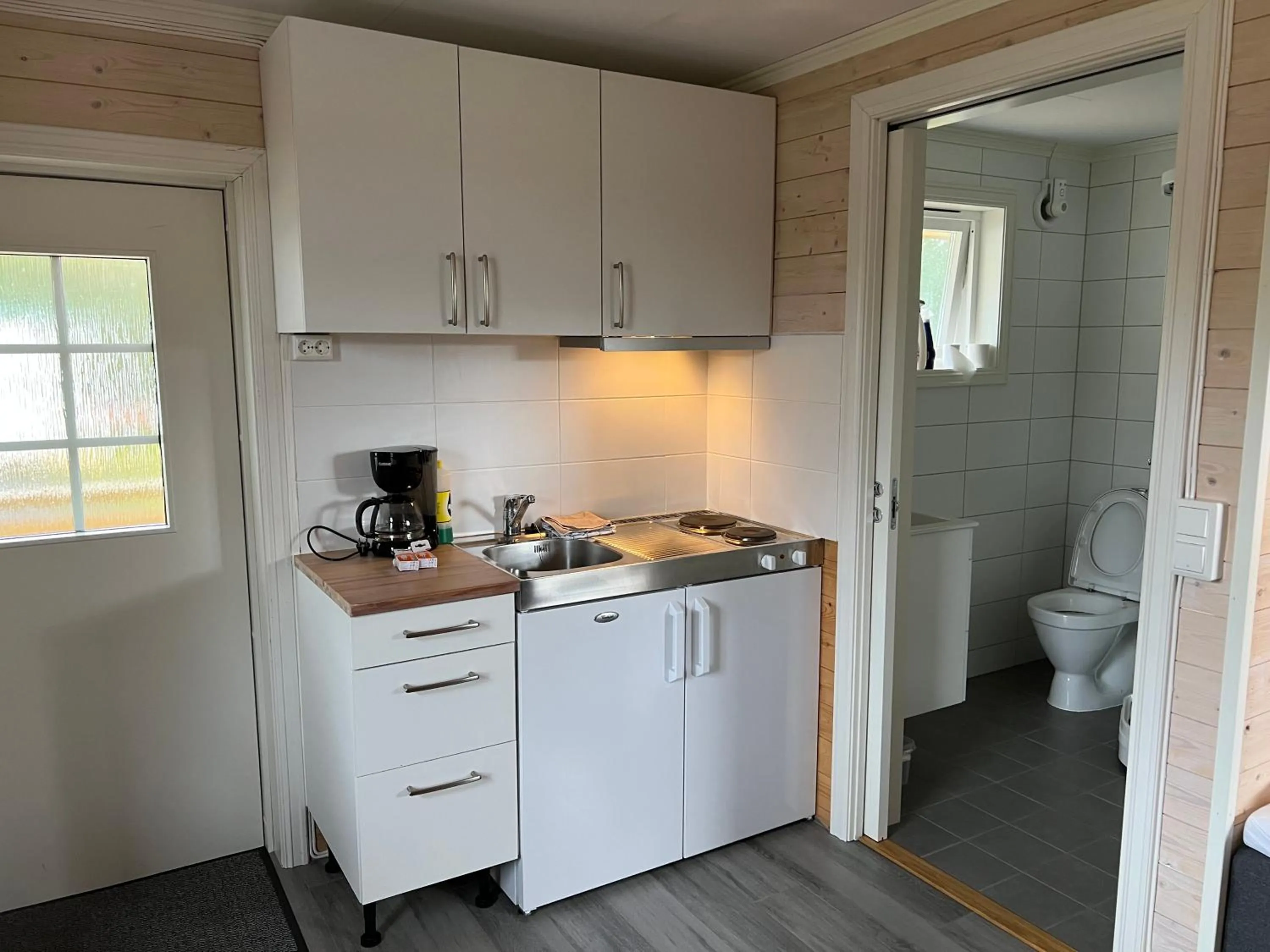 Kitchen or kitchenette in Kabelvåg Feriehus & Camping