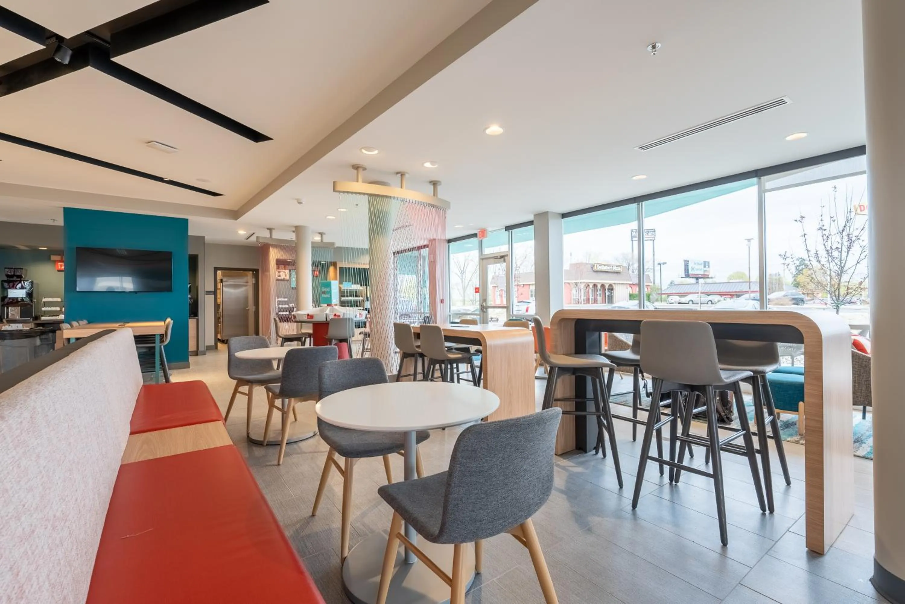 Seating area in avid hotels - Kalamazoo East by IHG