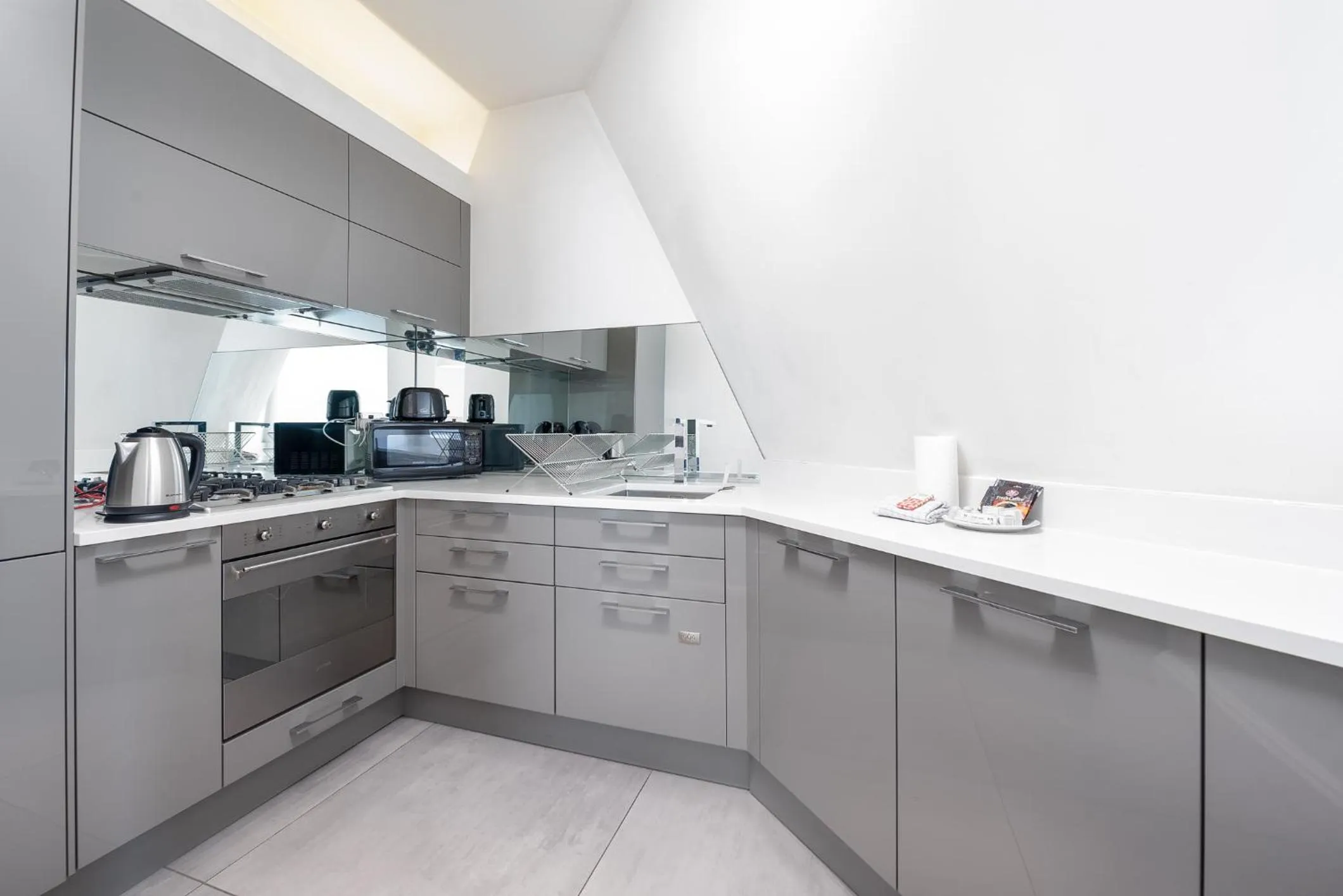 Kitchen or kitchenette in Grosvenor Gardens by CAPITAL