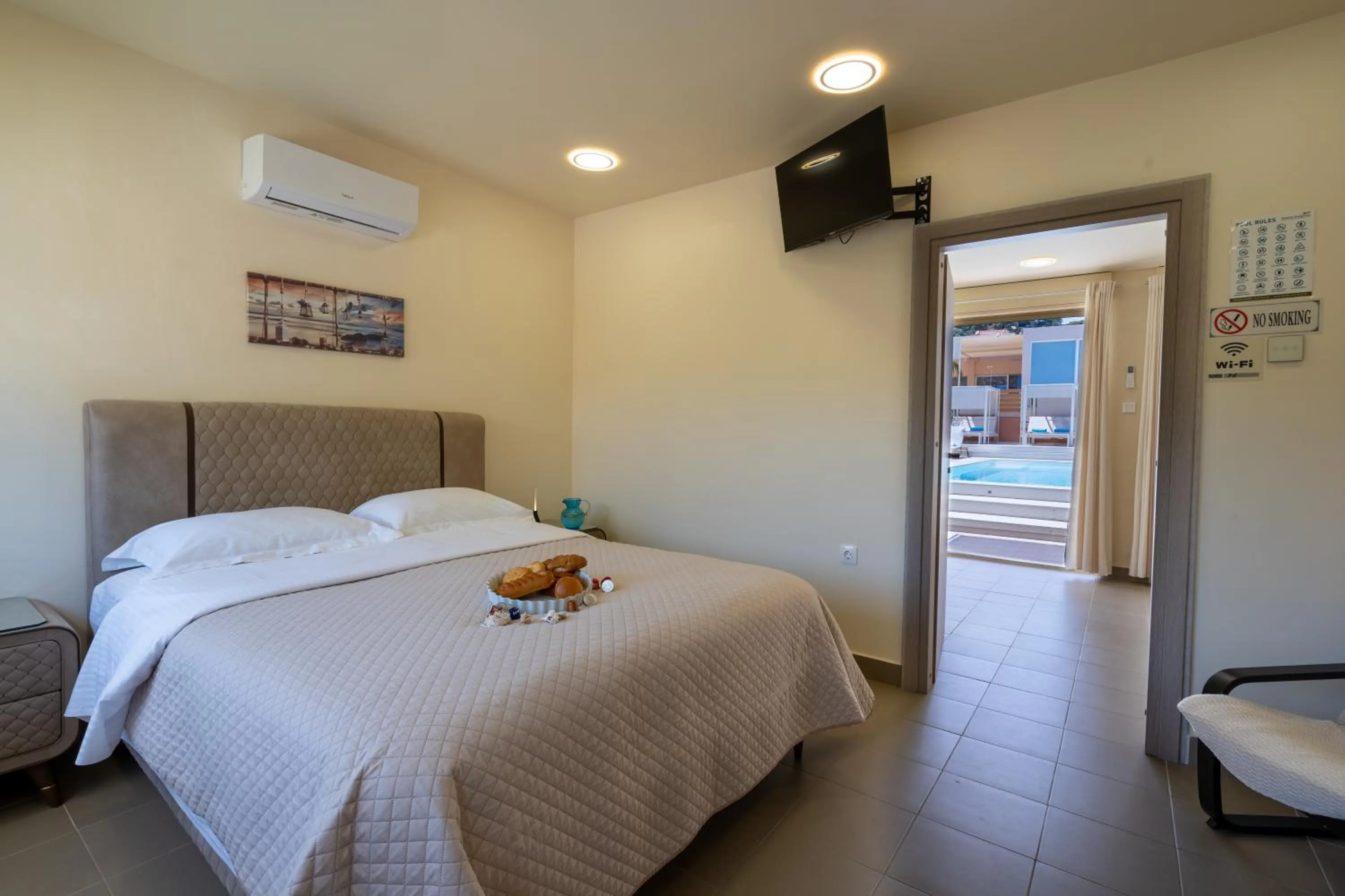 Swimming pool, Bed in Modular Bungalows With Heated Pool Artemis Greece