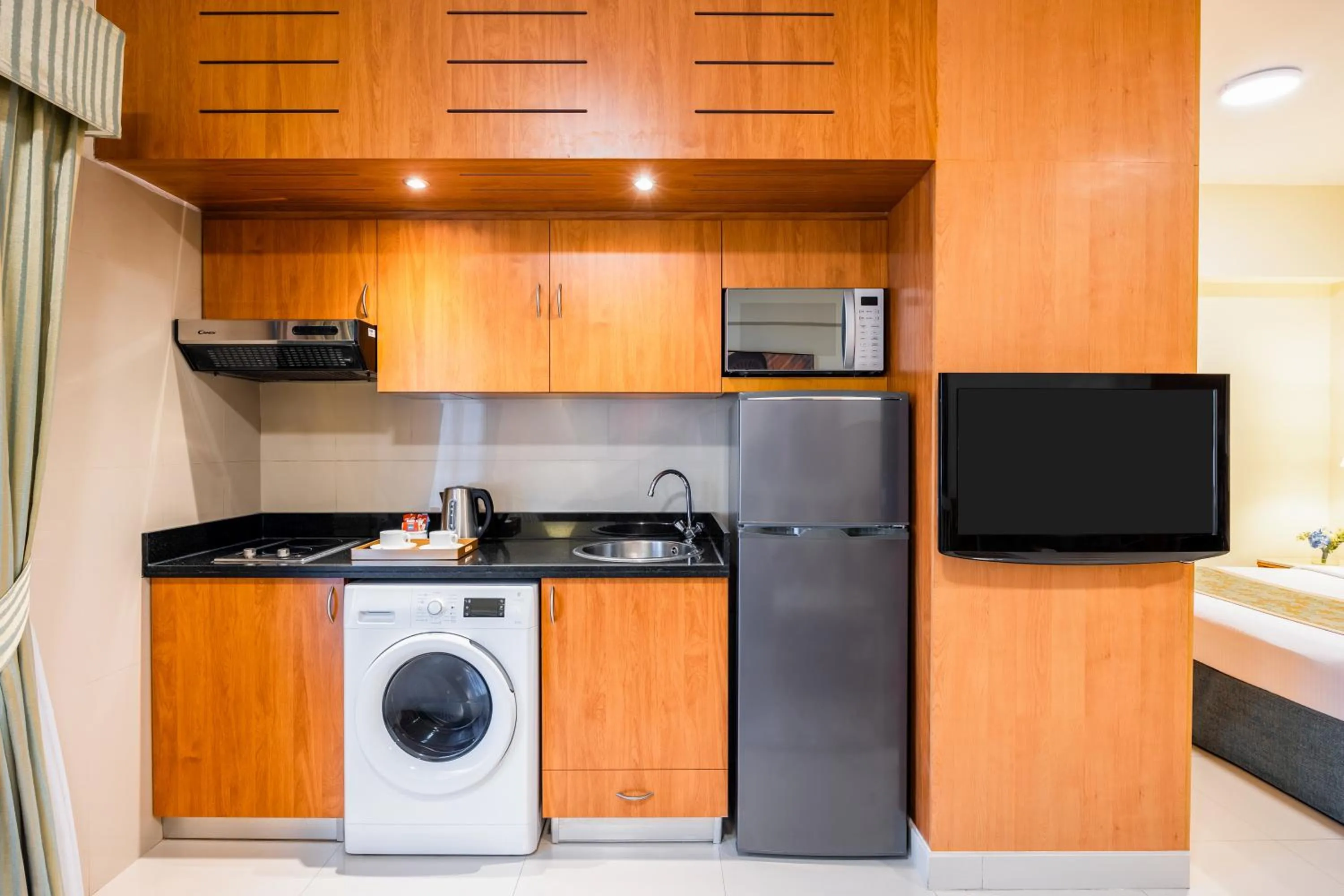 Kitchen or kitchenette in Golden Sands Hotel Apartments