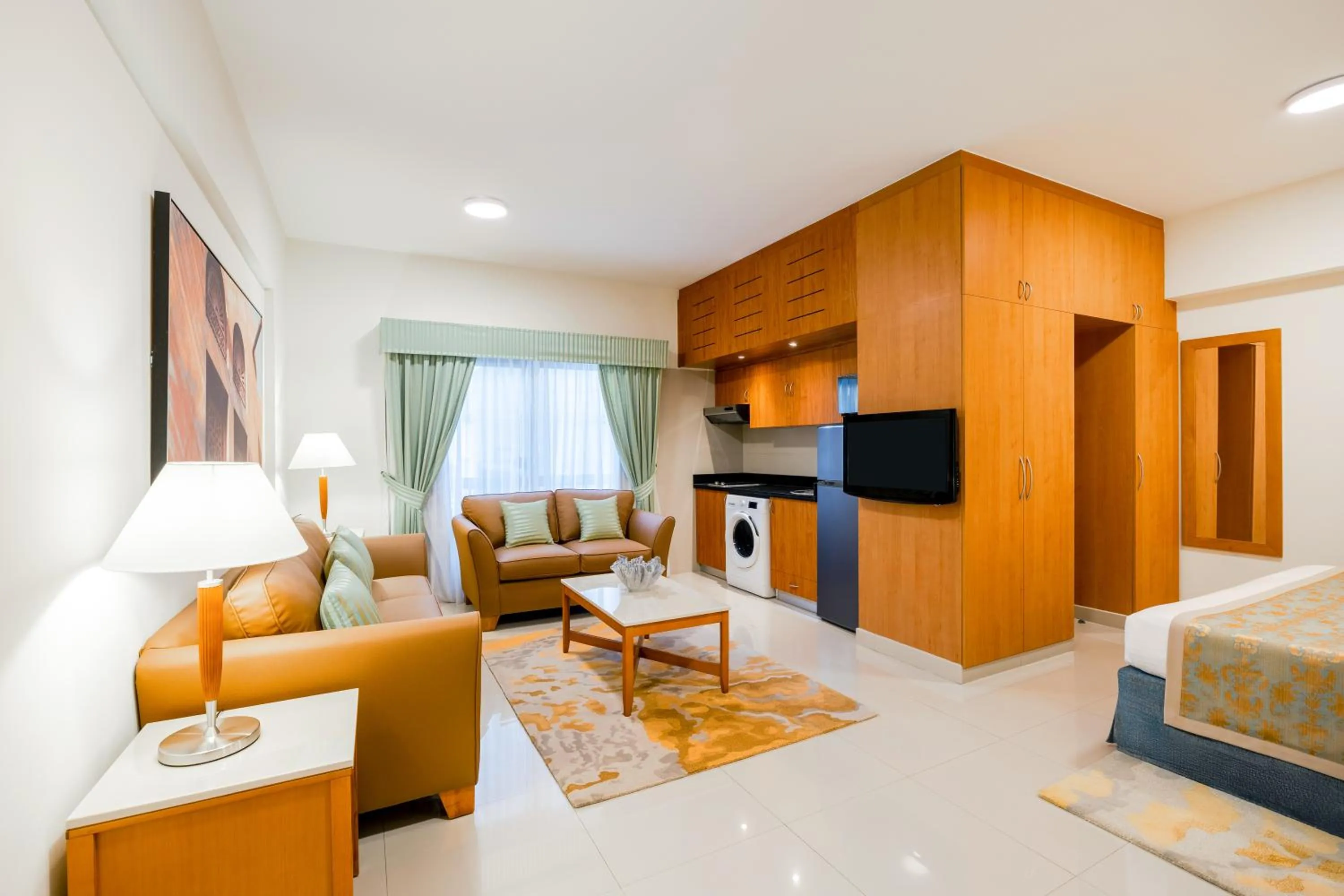 Kitchen or kitchenette, Bed in Golden Sands Hotel Apartments