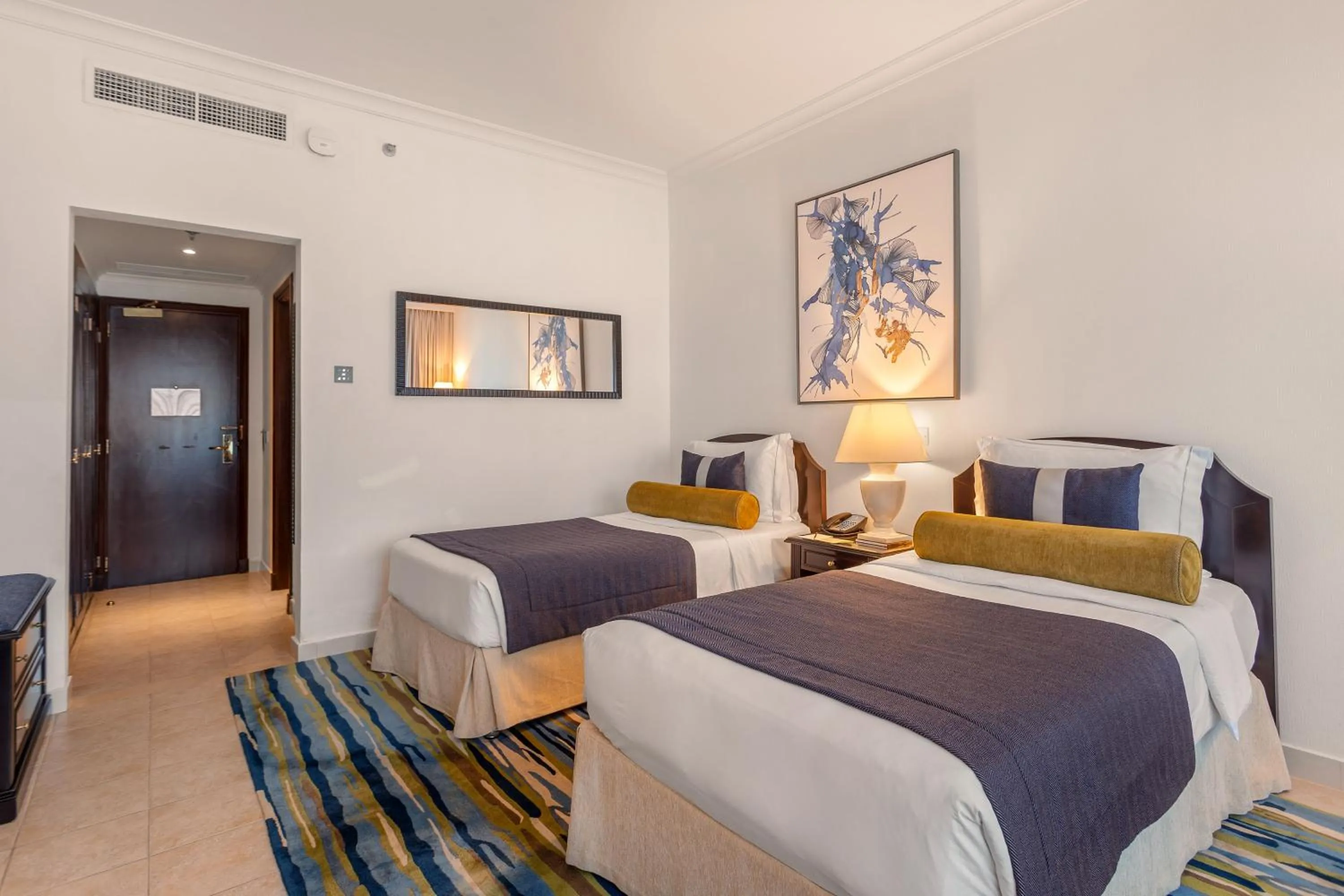 Bed in Ajman Hotel & Villas by Blazon Hotels