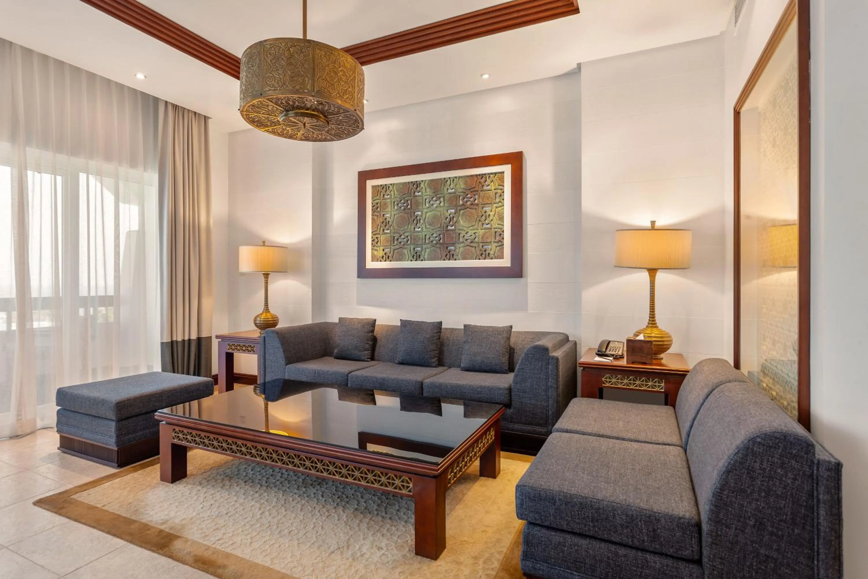 Living room in Ajman Hotel & Villas by Blazon Hotels