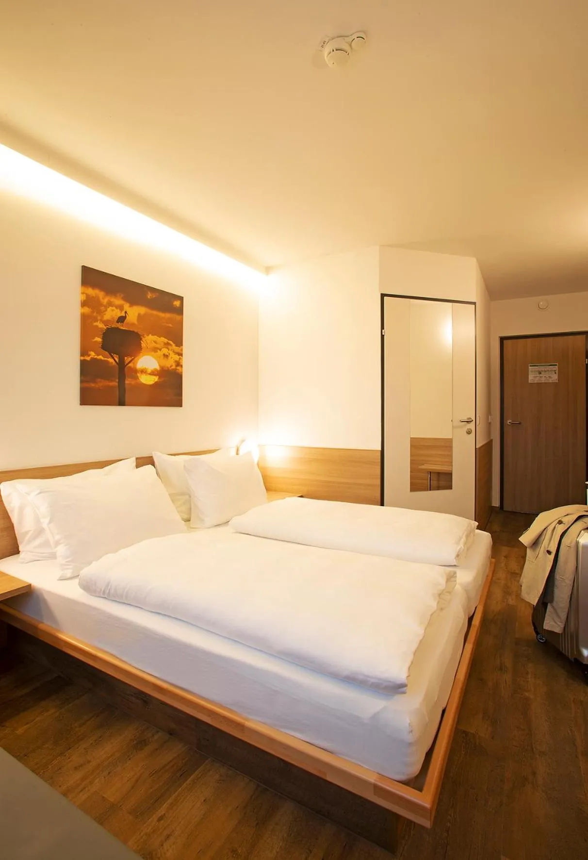 Photo of the whole room, Bed in OEKOTEL Hohenems