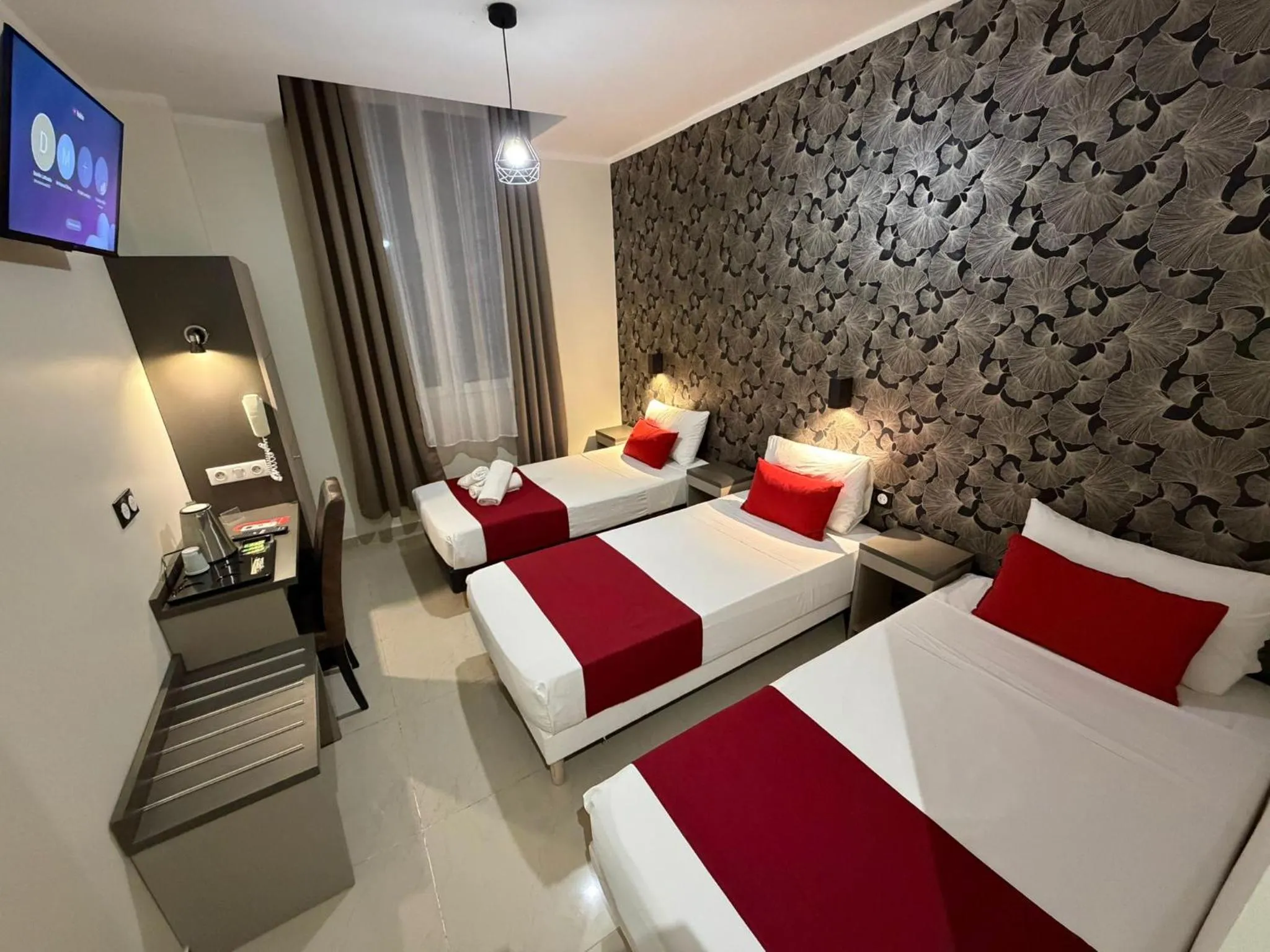 Bed in Evelia Hotels