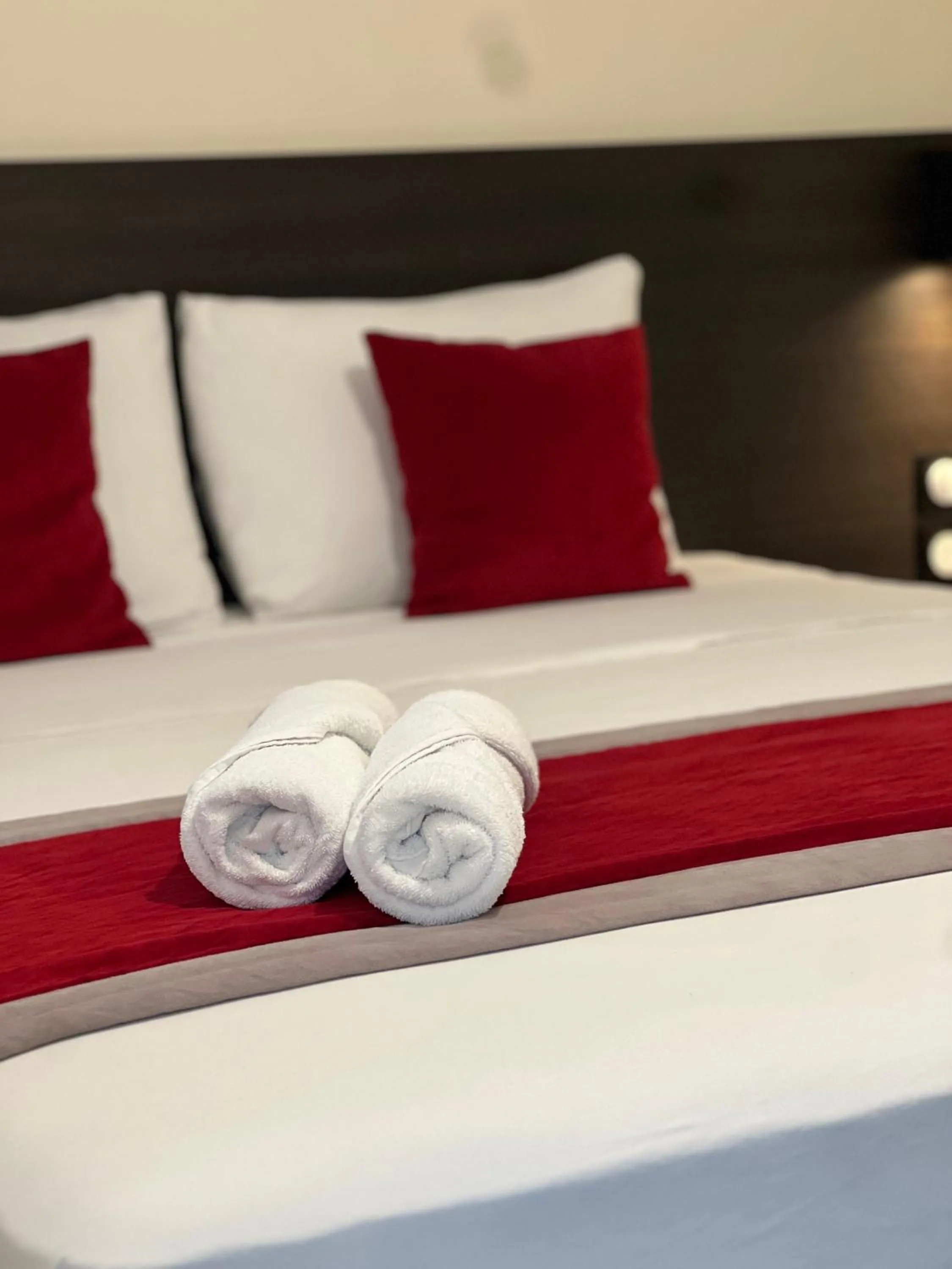 Bed in Evelia Hotels