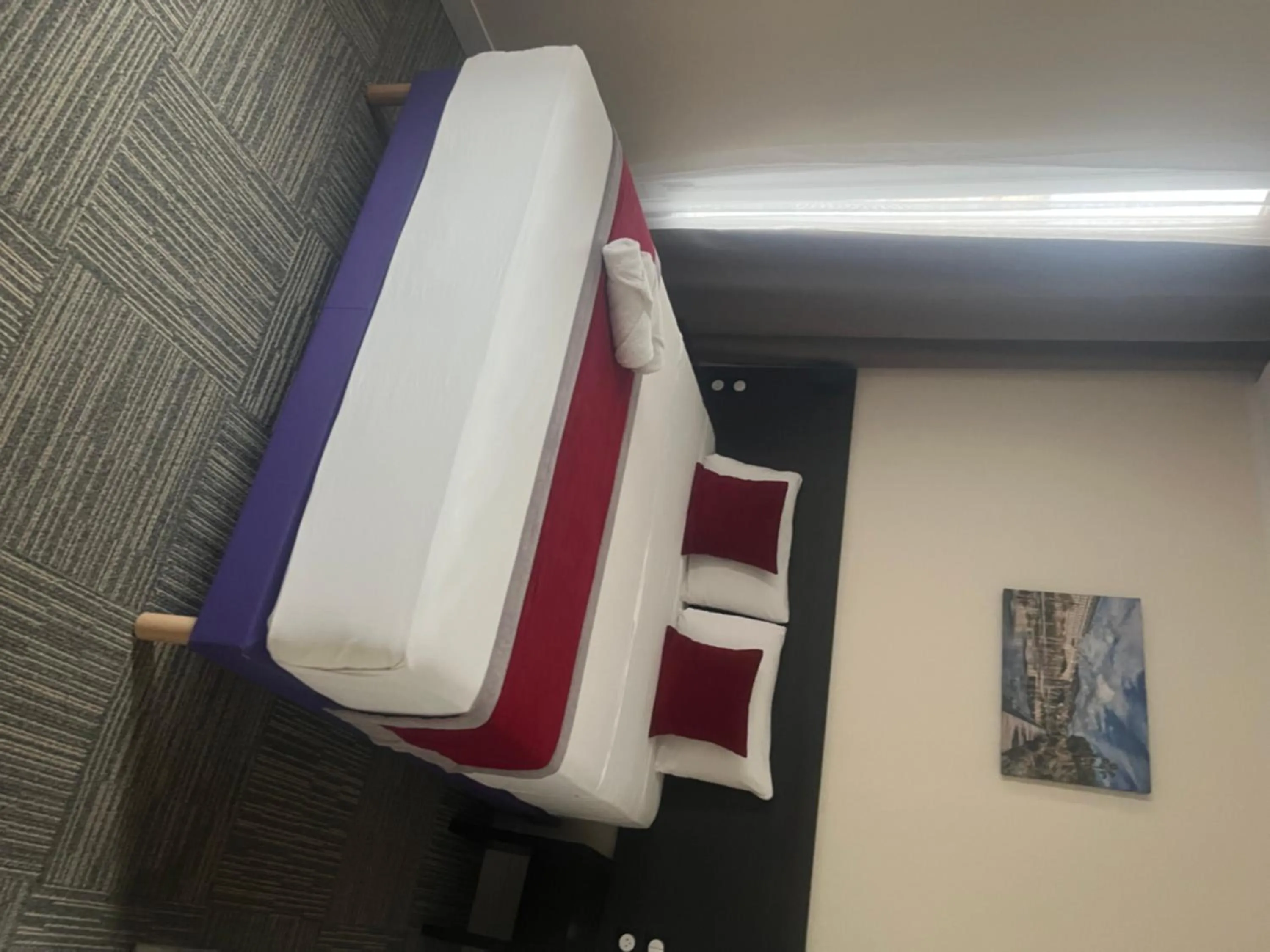 Bed in Evelia Hotels