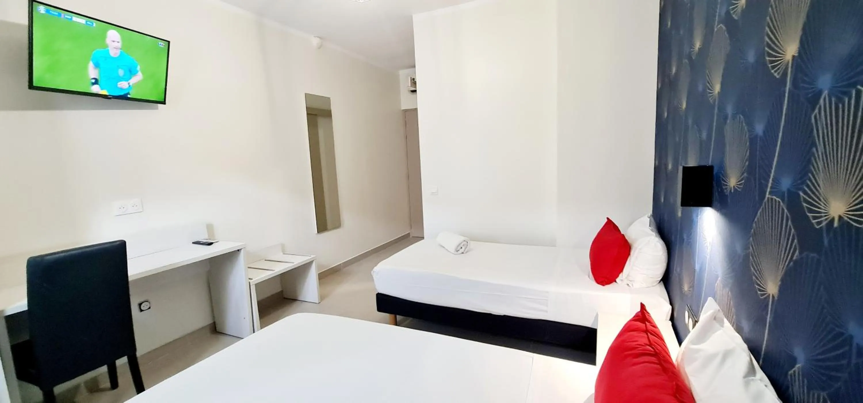 Bed in Evelia Hotels