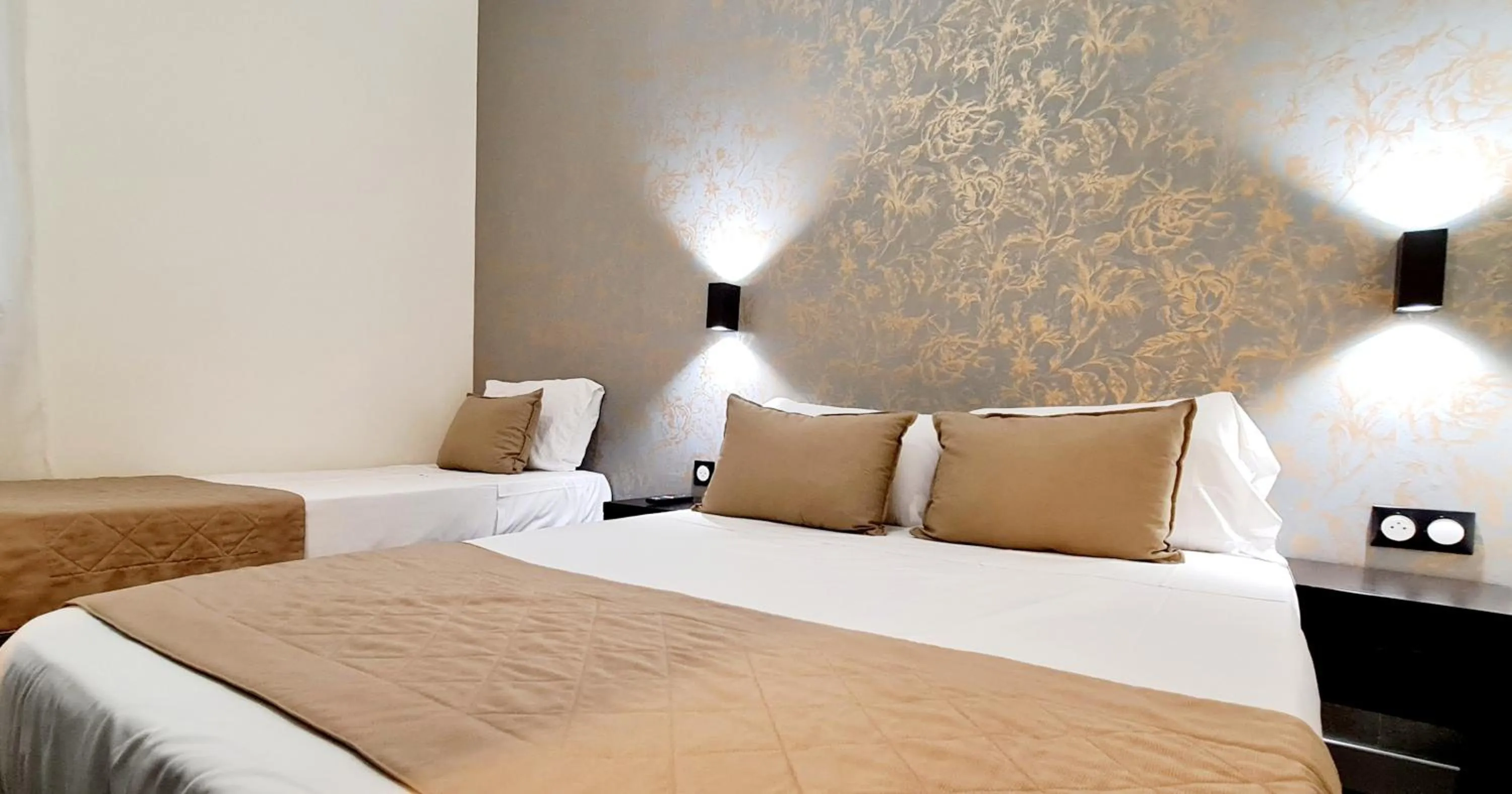Bed in Evelia Hotels