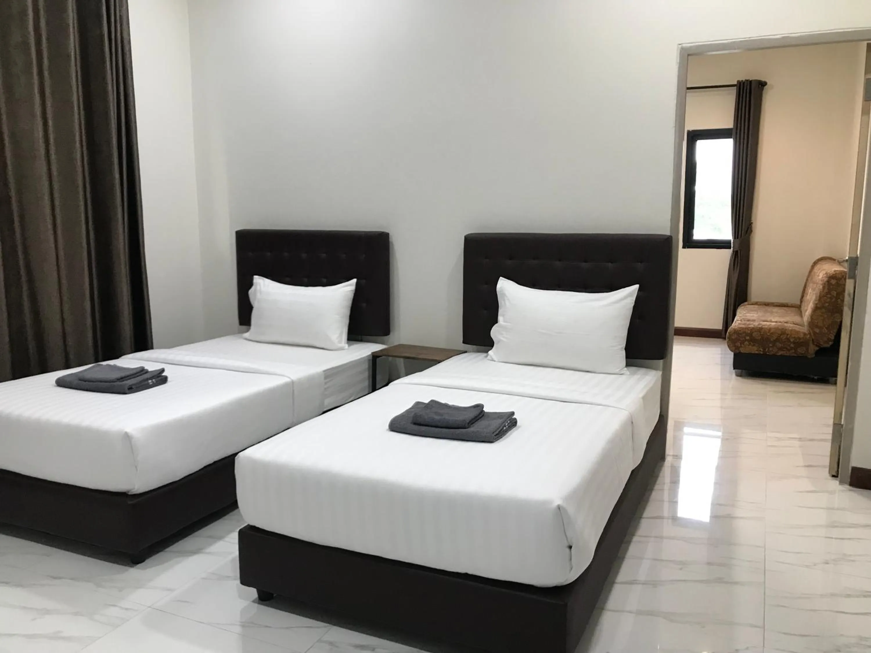 Bed in Park Villa Chaiyaphume