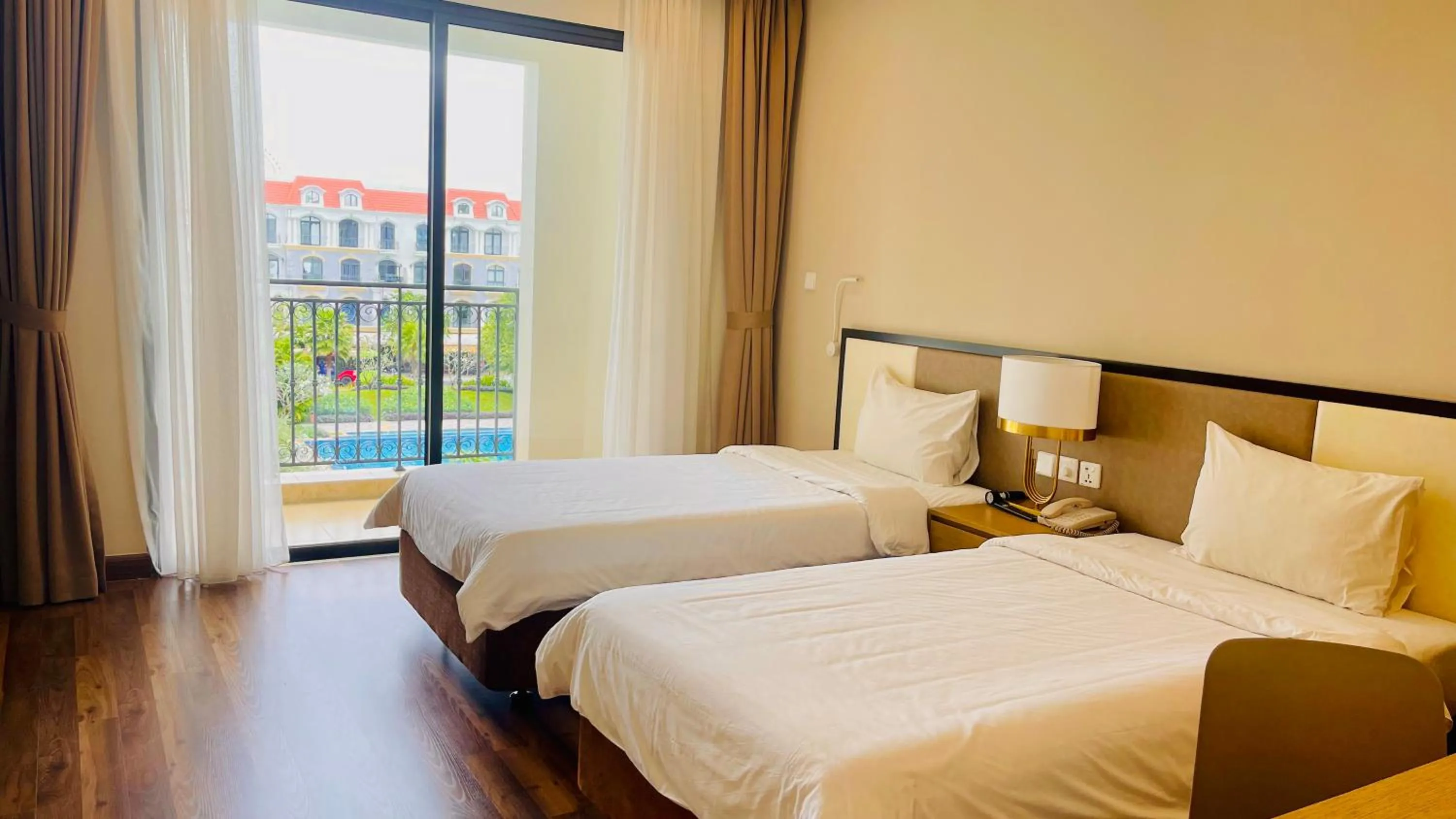 View (from property/room), Bed in Vinholidays Fiesta Phu Quoc