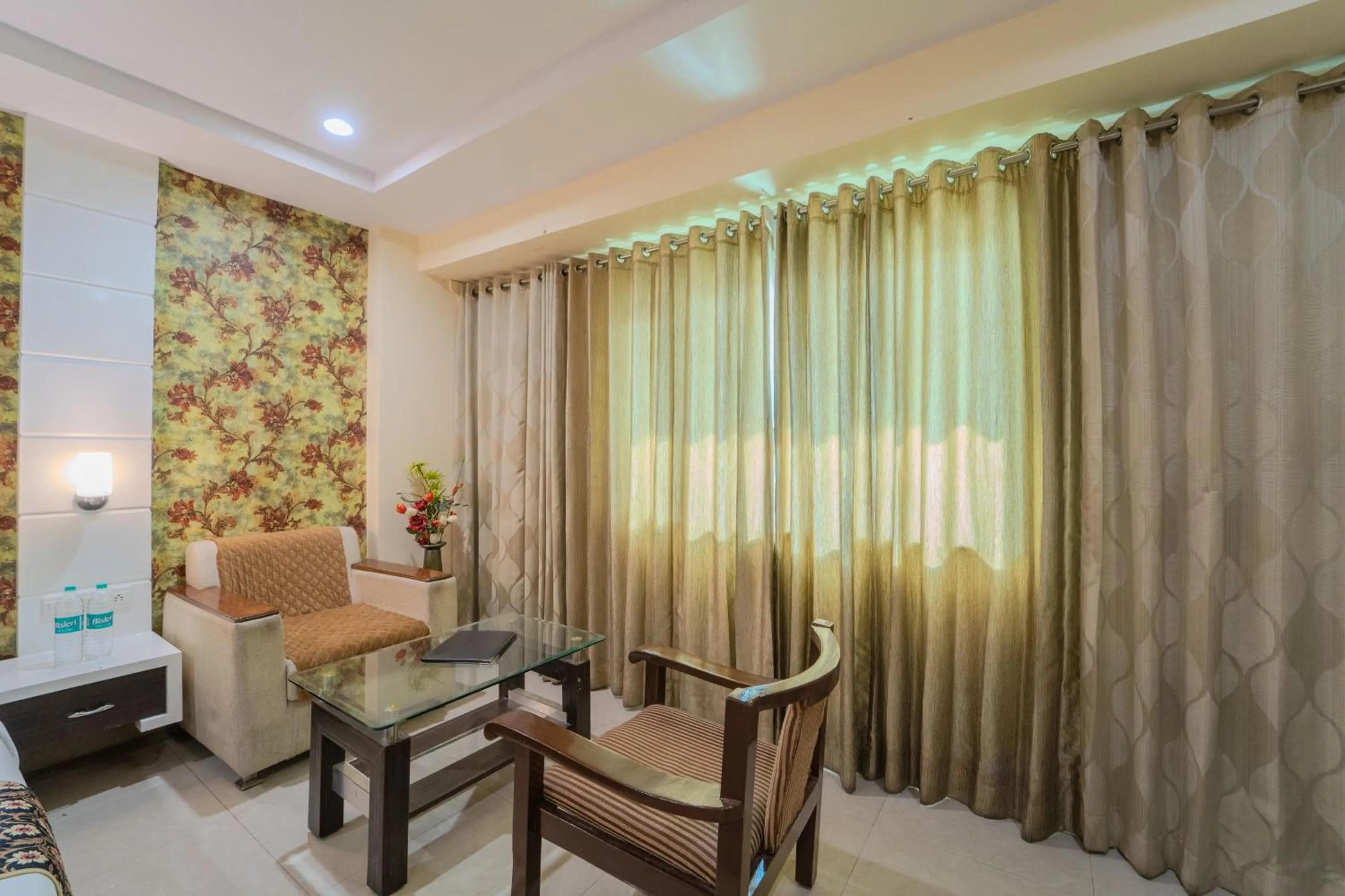 Seating area in Hotel City Square By KeyMagics