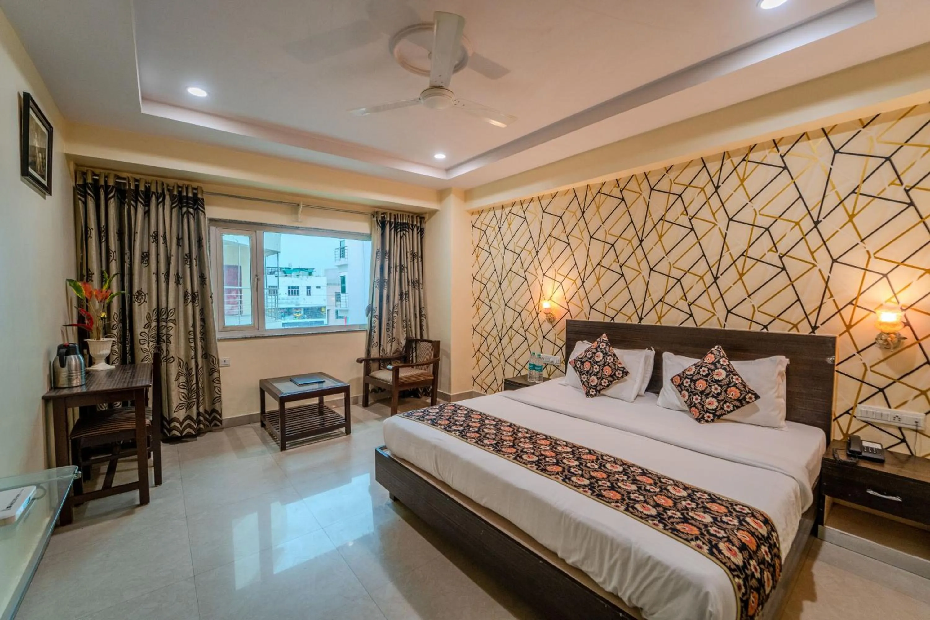 Photo of the whole room, Bed in Hotel City Square By KeyMagics