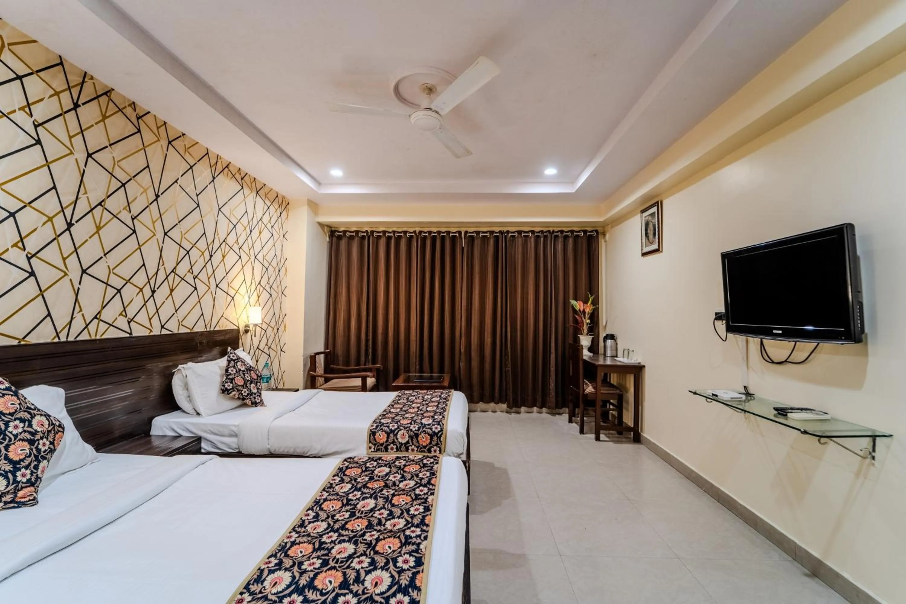 Photo of the whole room, Bed in Hotel City Square By KeyMagics