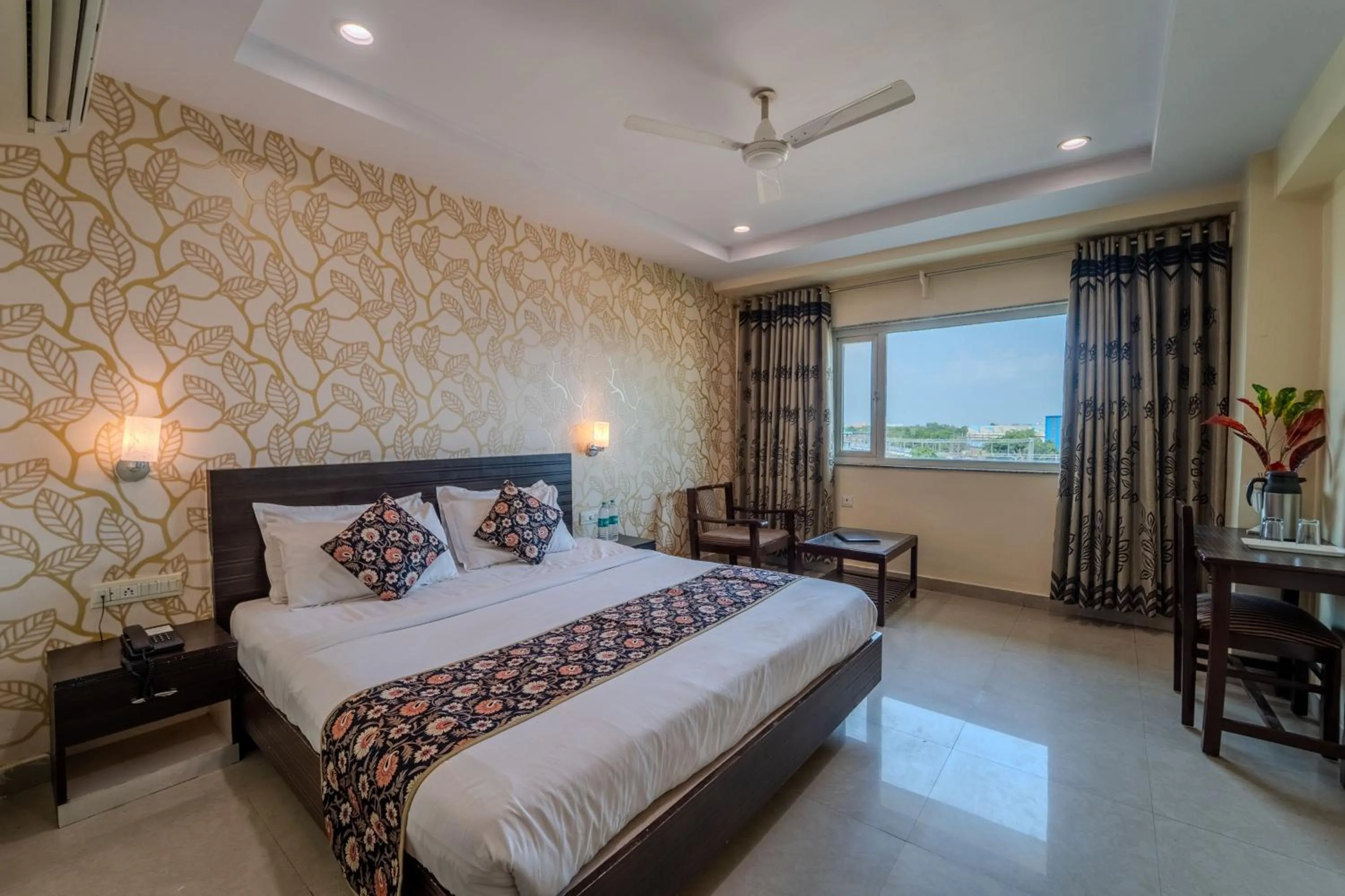 Photo of the whole room, Bed in Hotel City Square By KeyMagics