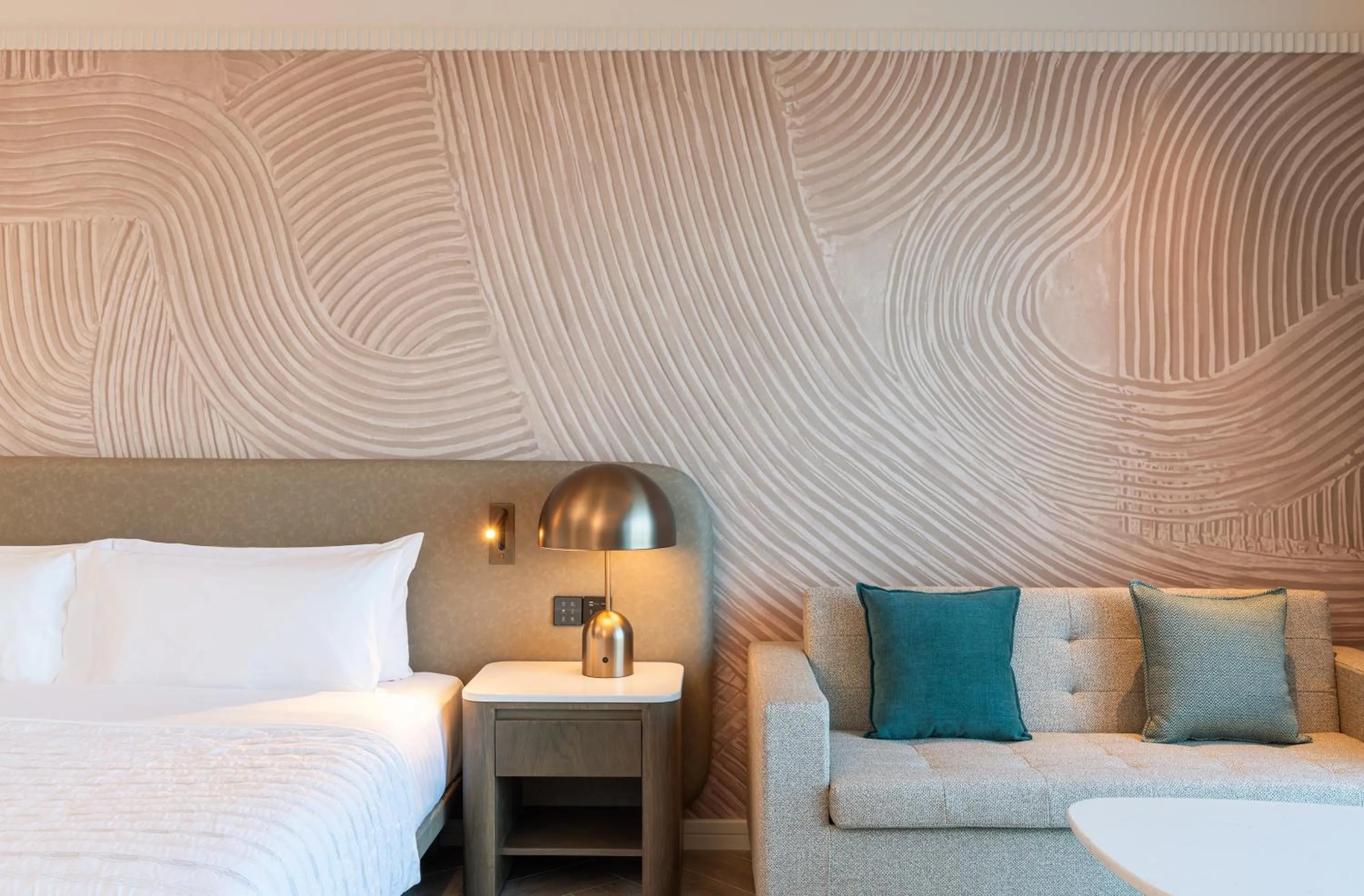 Seating area, Bed in Le Meridien Al Aqah Beach Resort