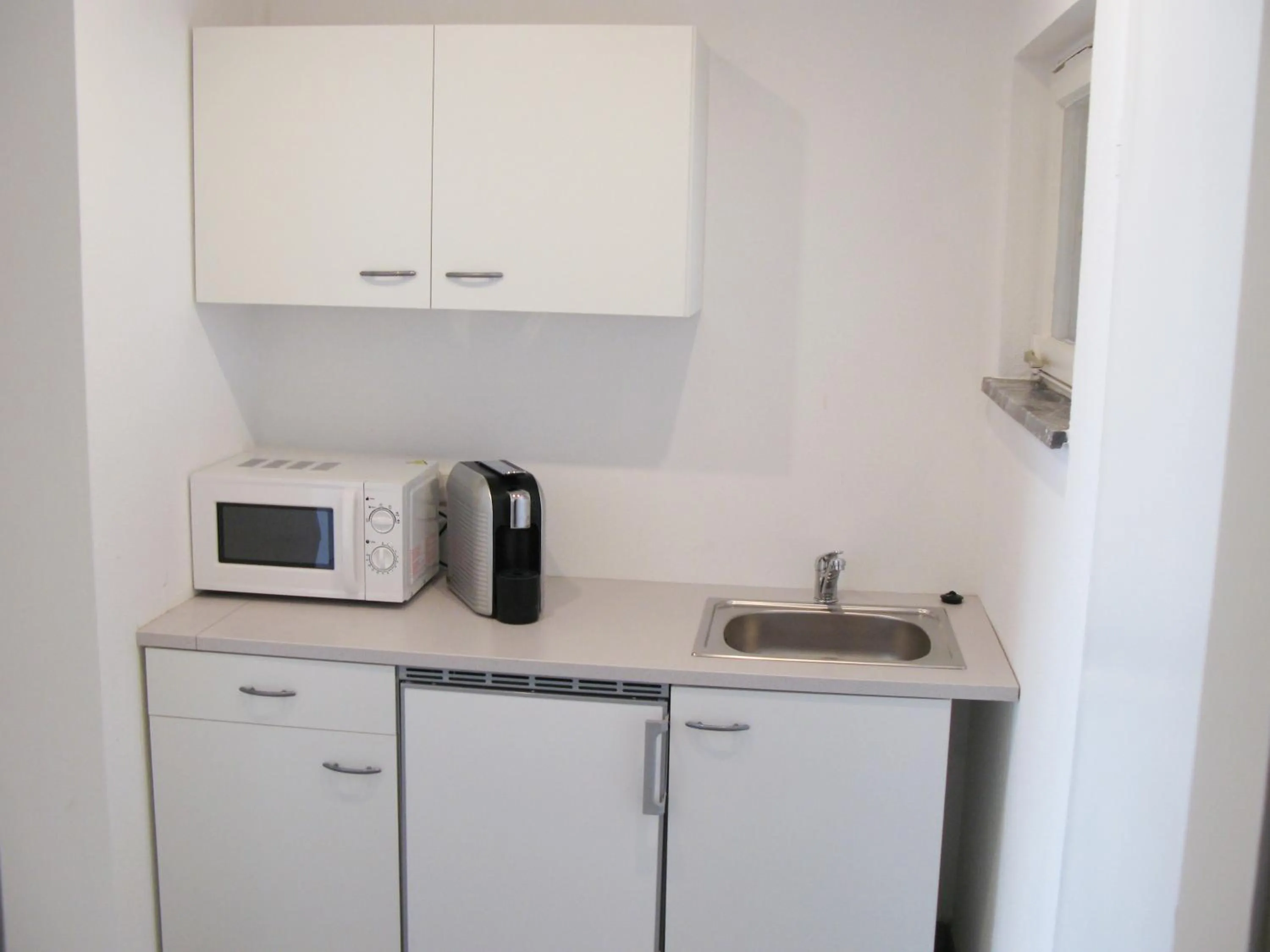 Kitchen or kitchenette in Murgtal Motel