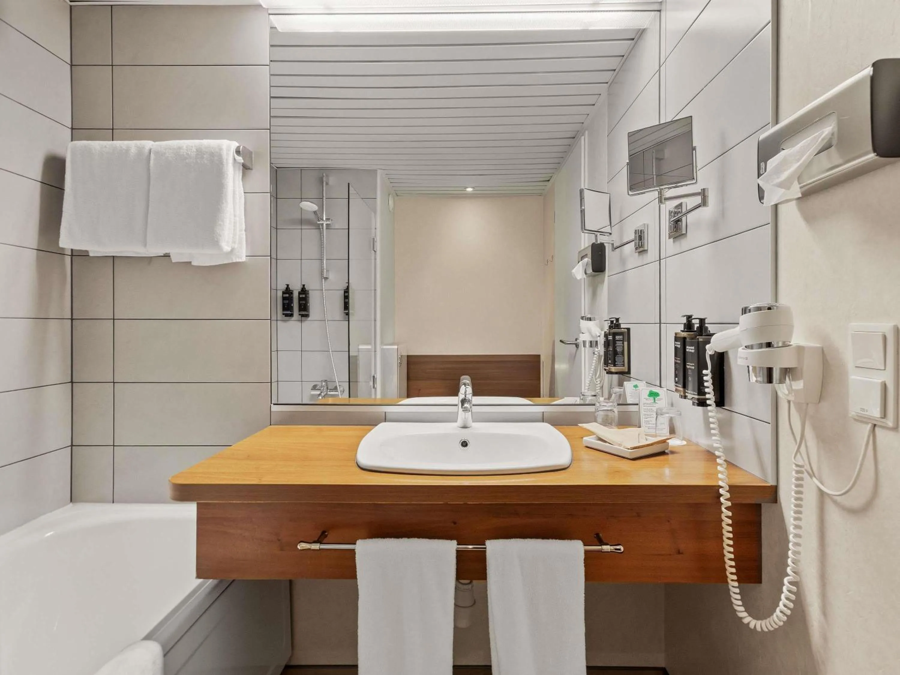 Bathroom in Mercure Hotel Hamburg am Volkspark