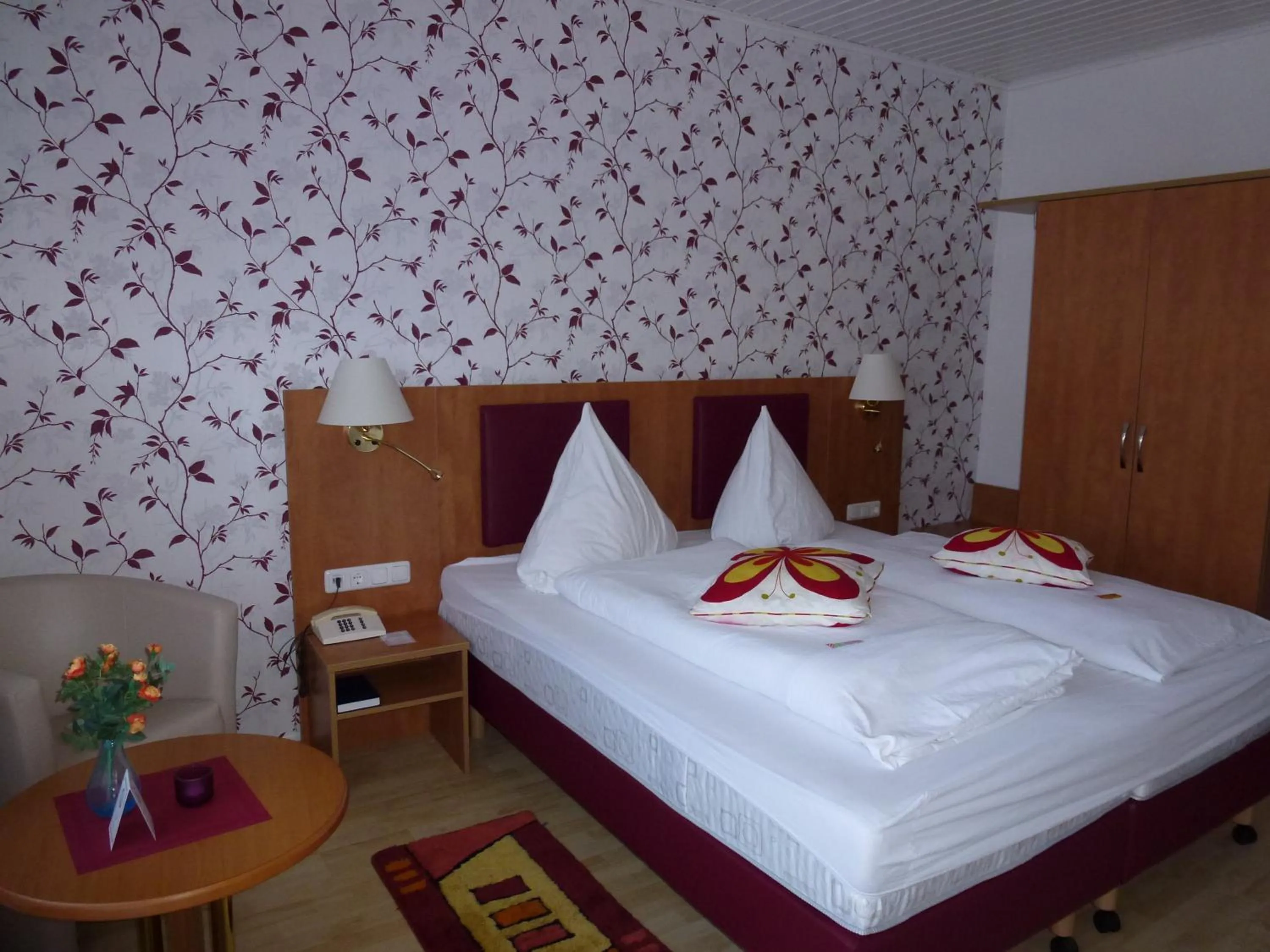 Bed in Hotel Wildunger Hof mit Gemeinschaftsküche