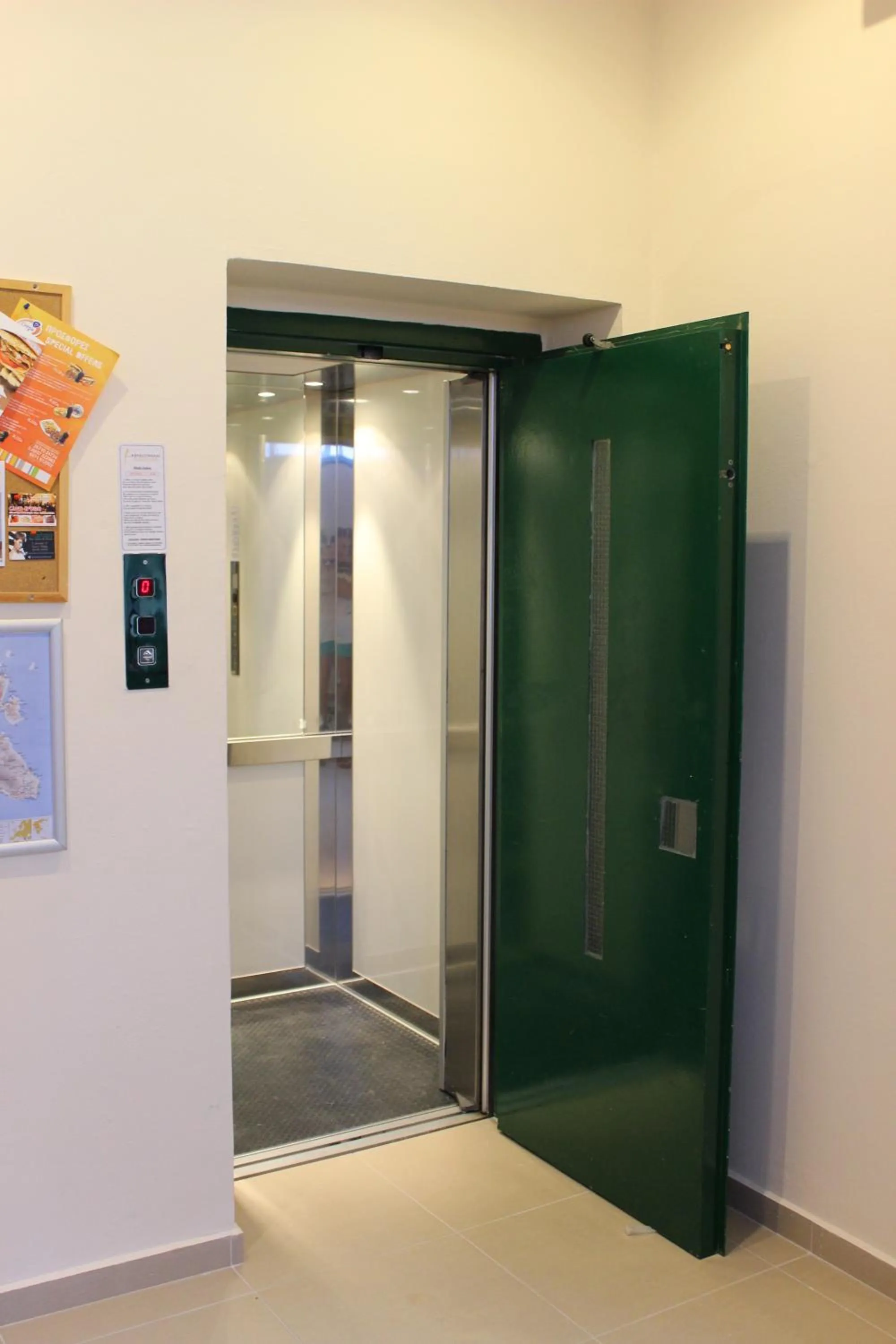 Facade/entrance in Rouchotas Apartments