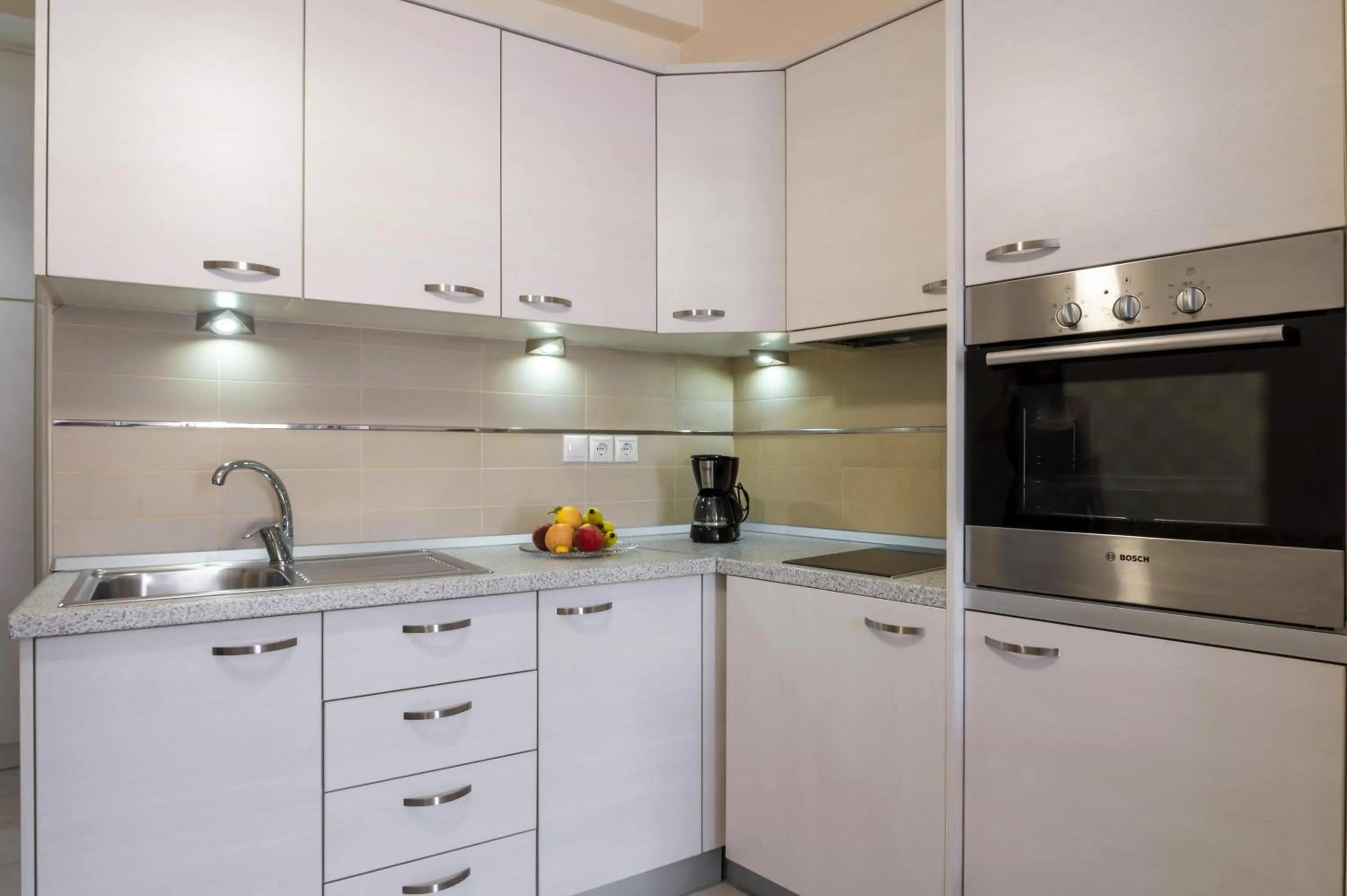 Kitchen or kitchenette in Rouchotas Apartments