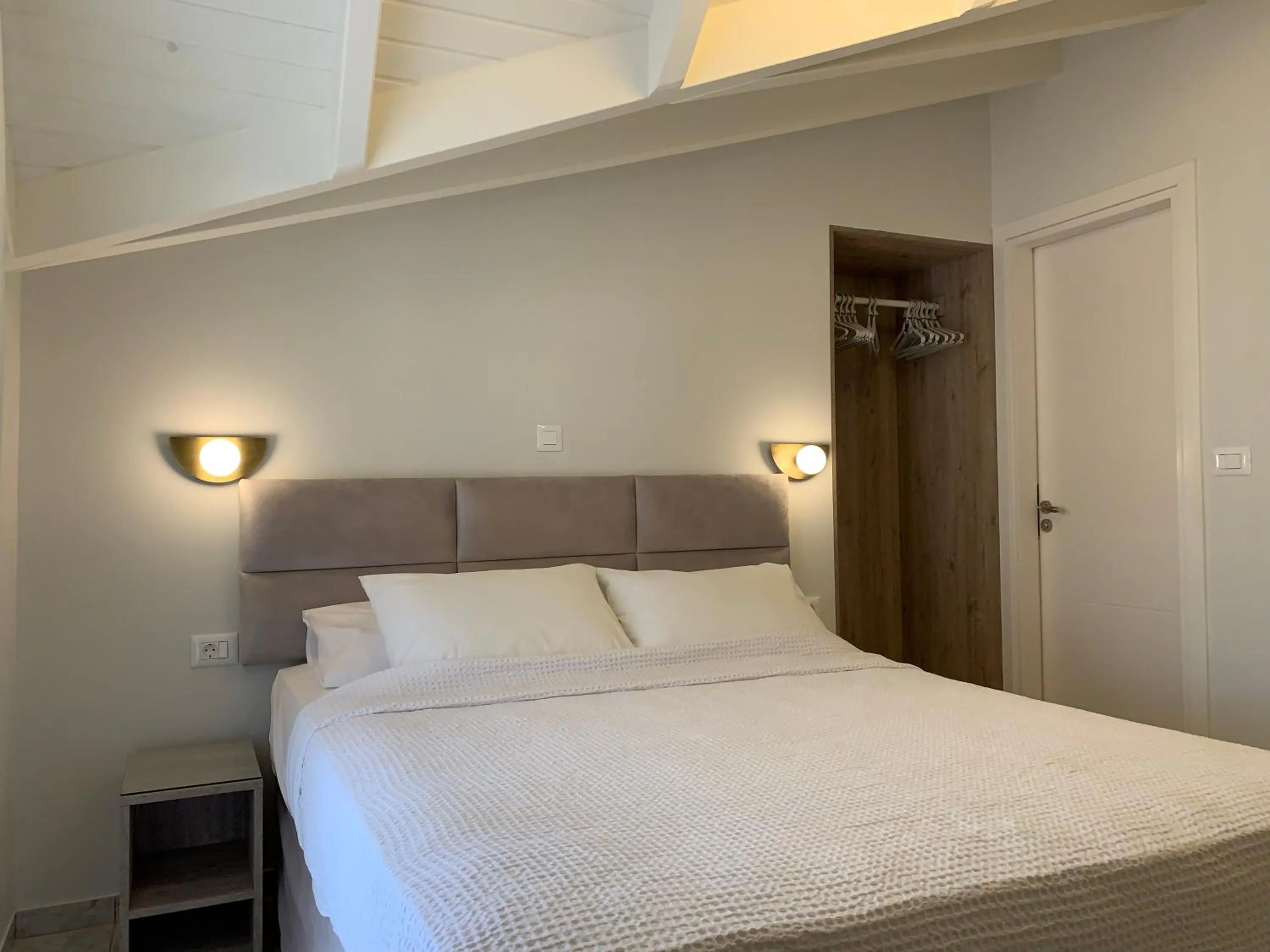 Bed in Rouchotas Apartments